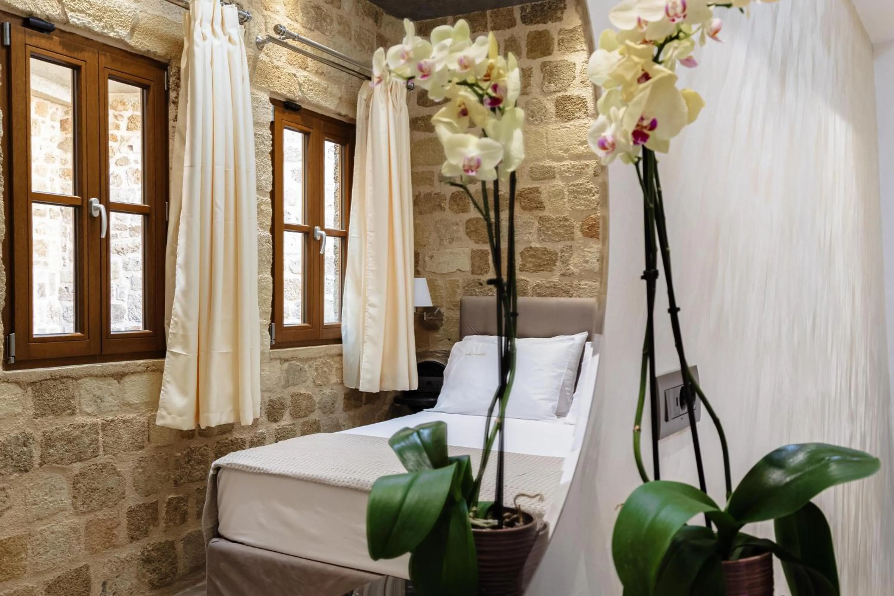 Bed in Chateau Anax Luxury suites