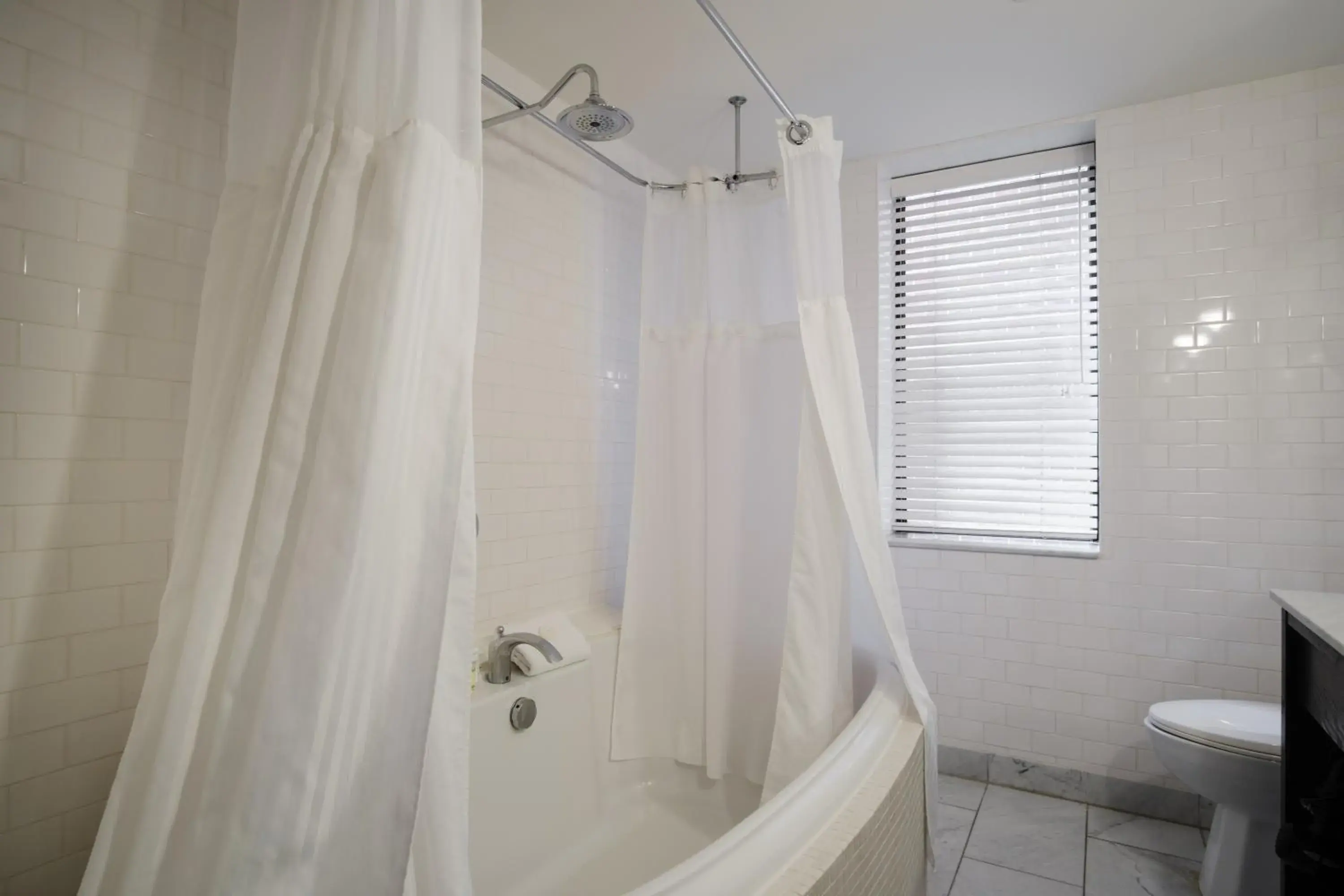 Bathroom in Arc The Hotel Bathroom in Arc The Hotel