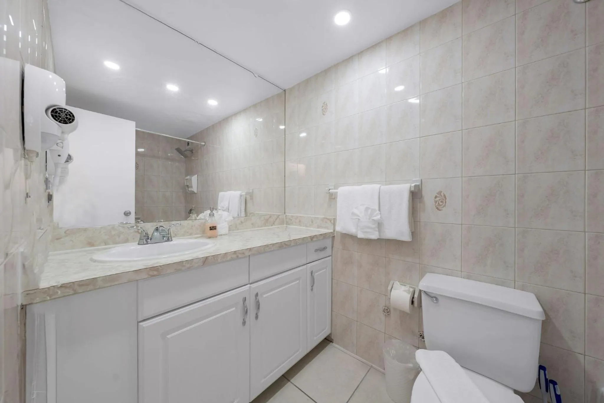 Shower in SeaStays Apartments