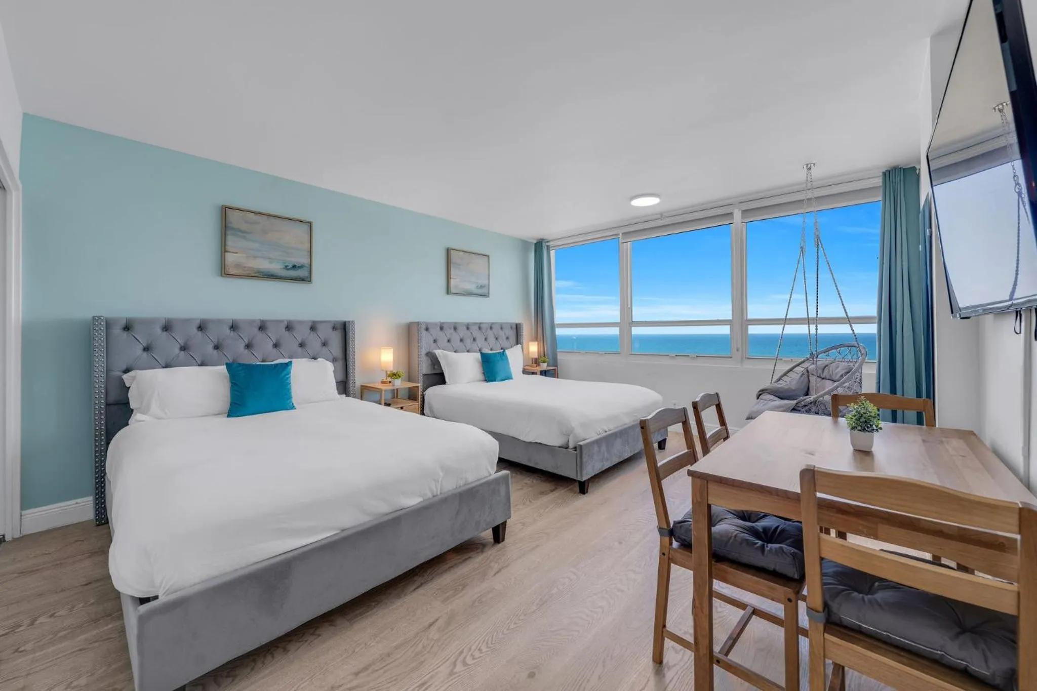 Bed in SeaStays Apartments