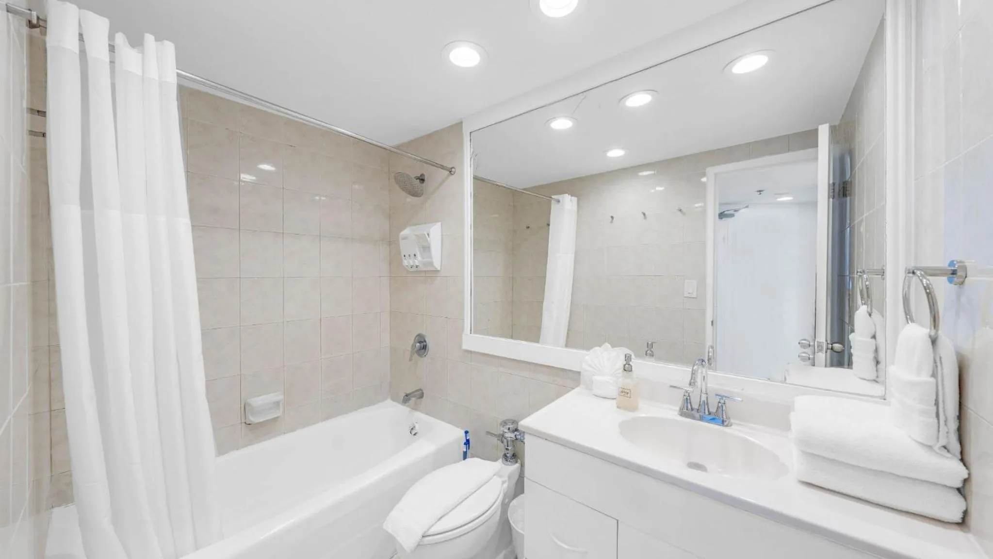 Shower in SeaStays Apartments