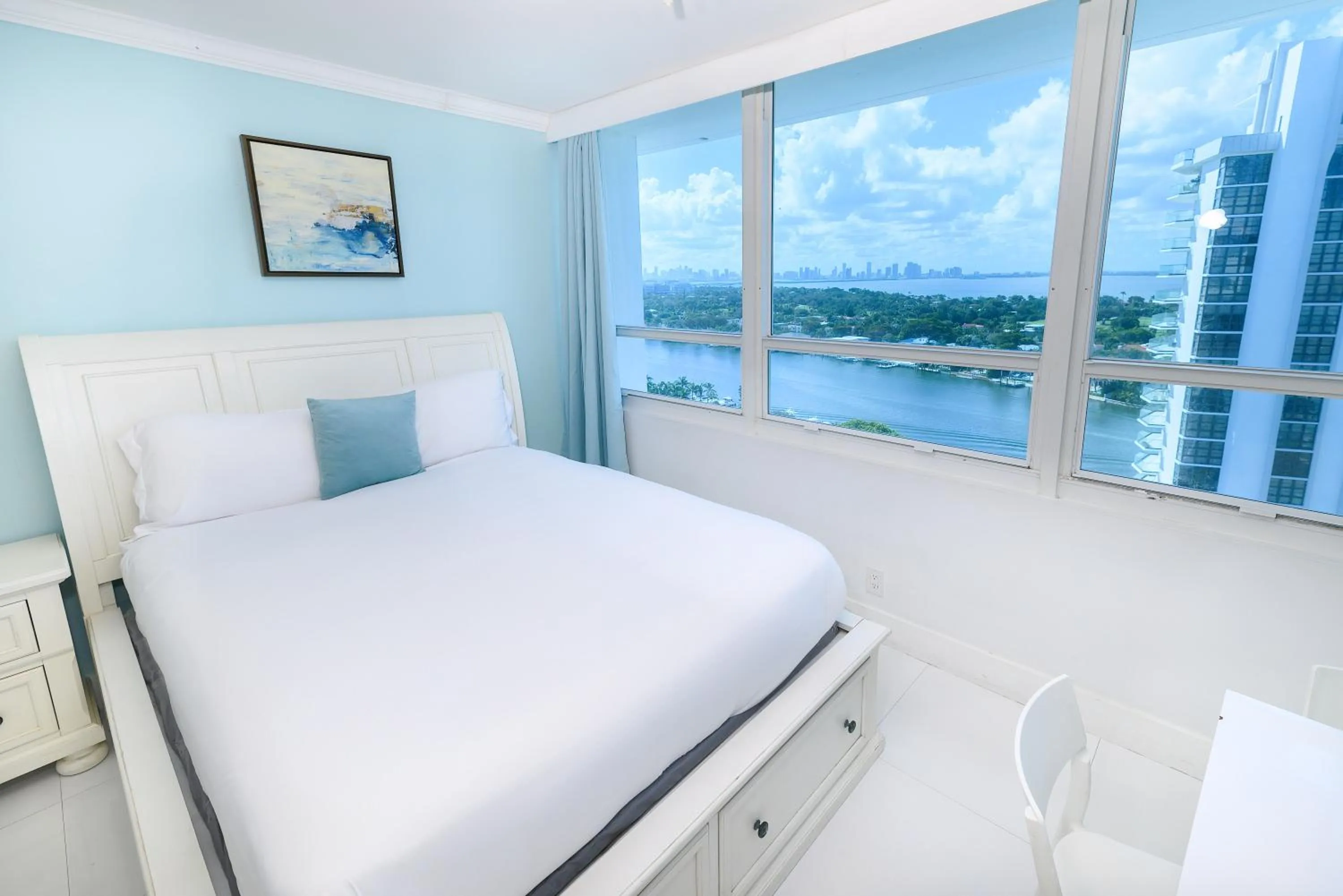 Bed in SeaStays Apartments