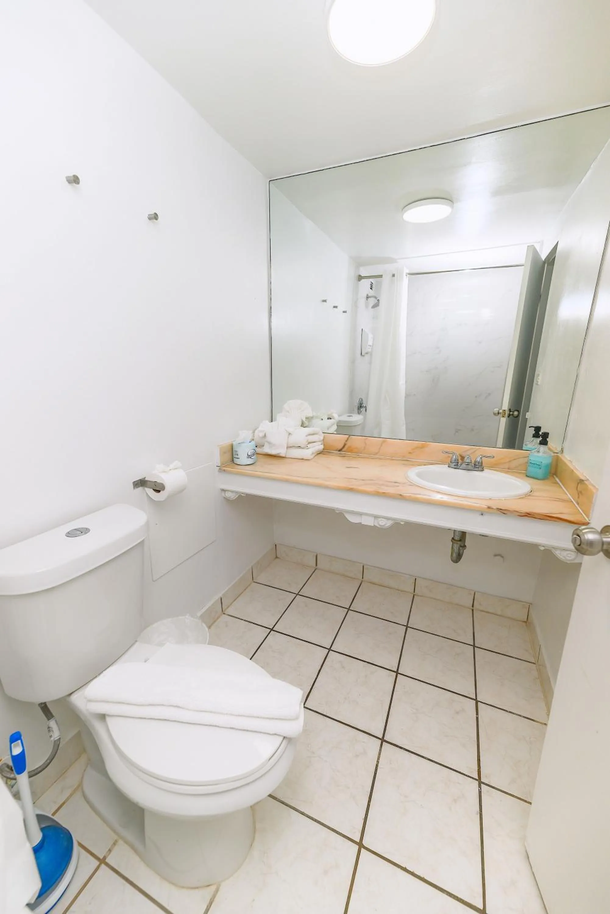 Shower in SeaStays Apartments