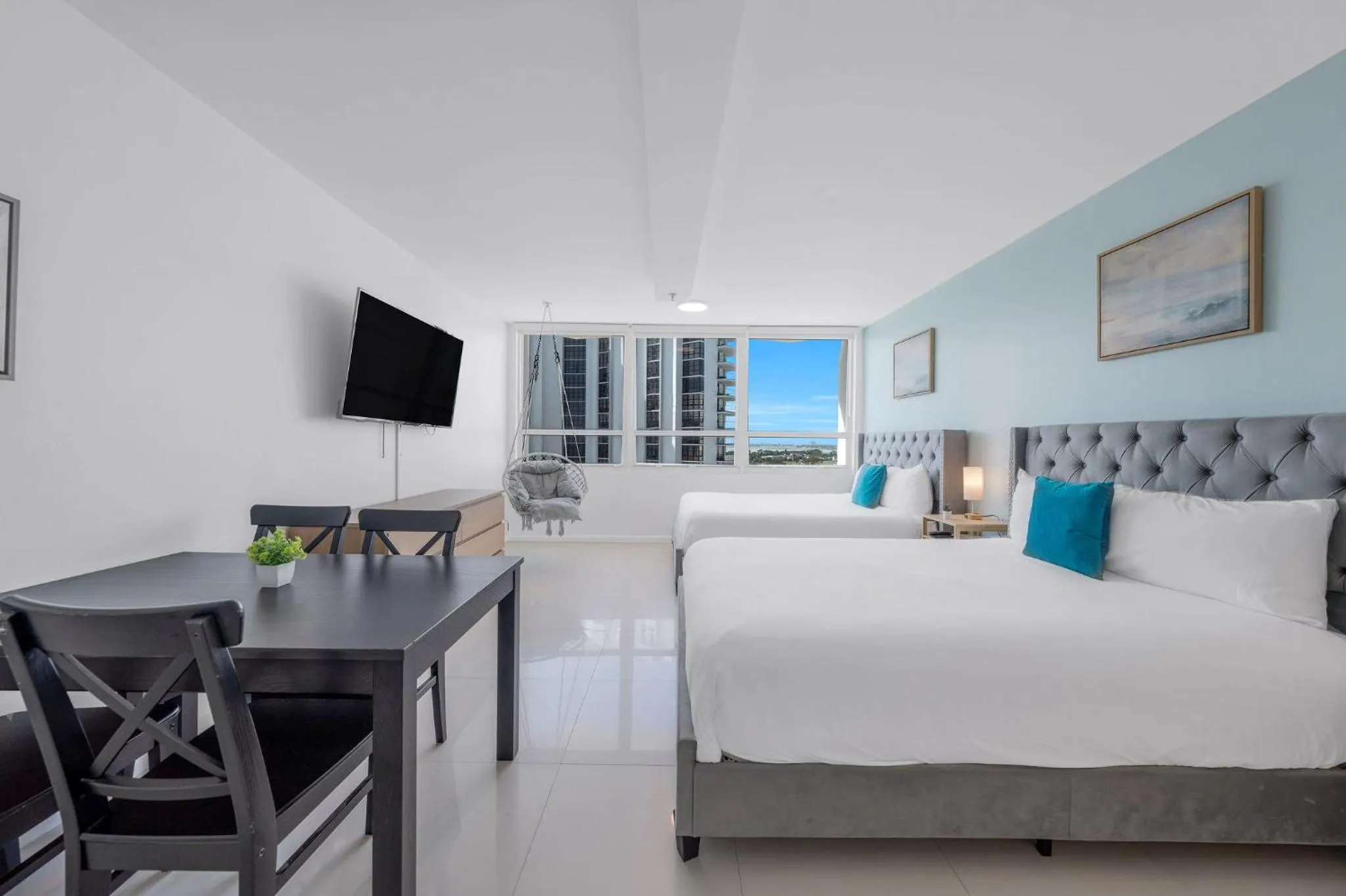 Bed in SeaStays Apartments