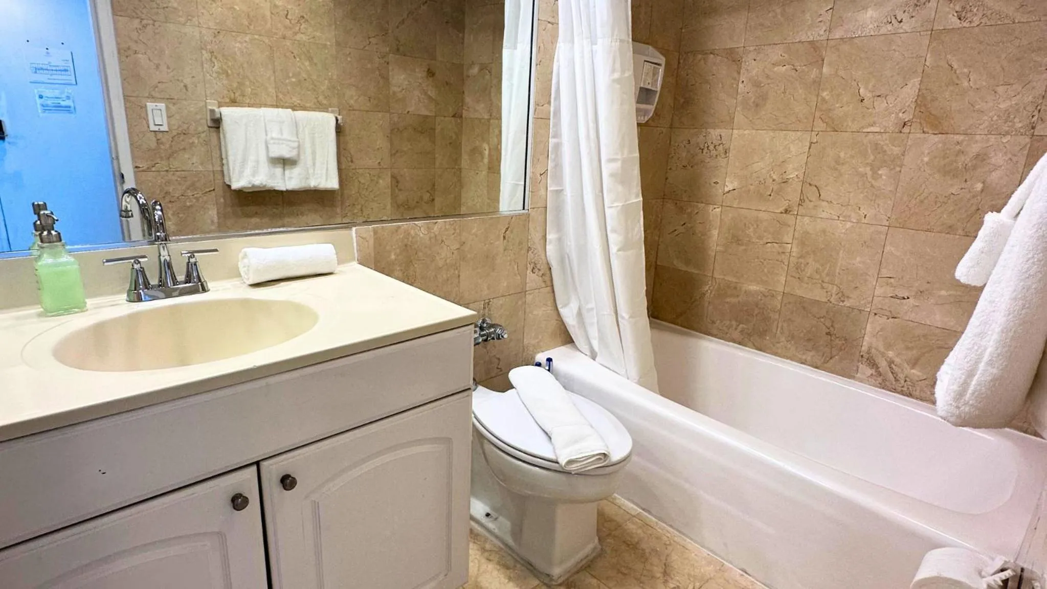 Shower in SeaStays Apartments