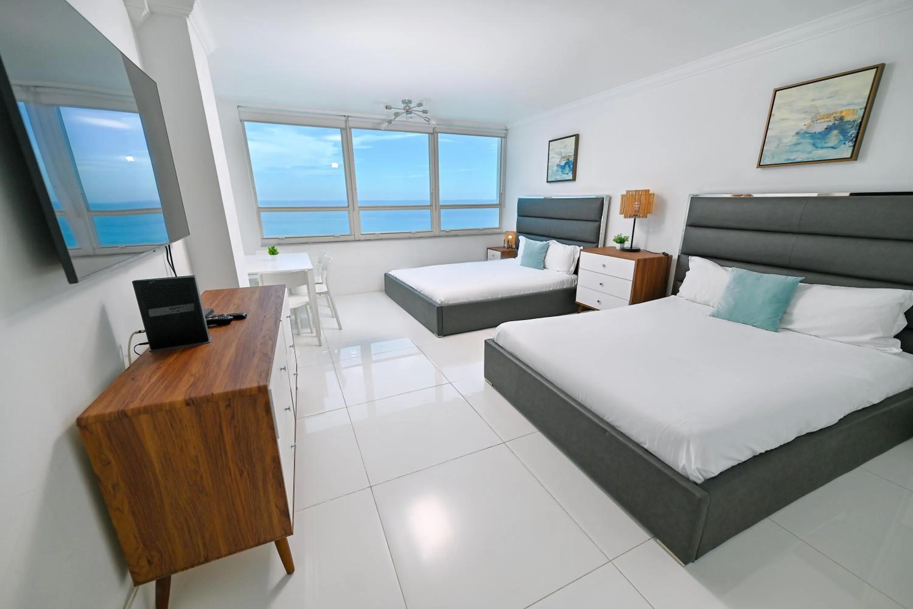 Bed in SeaStays Apartments