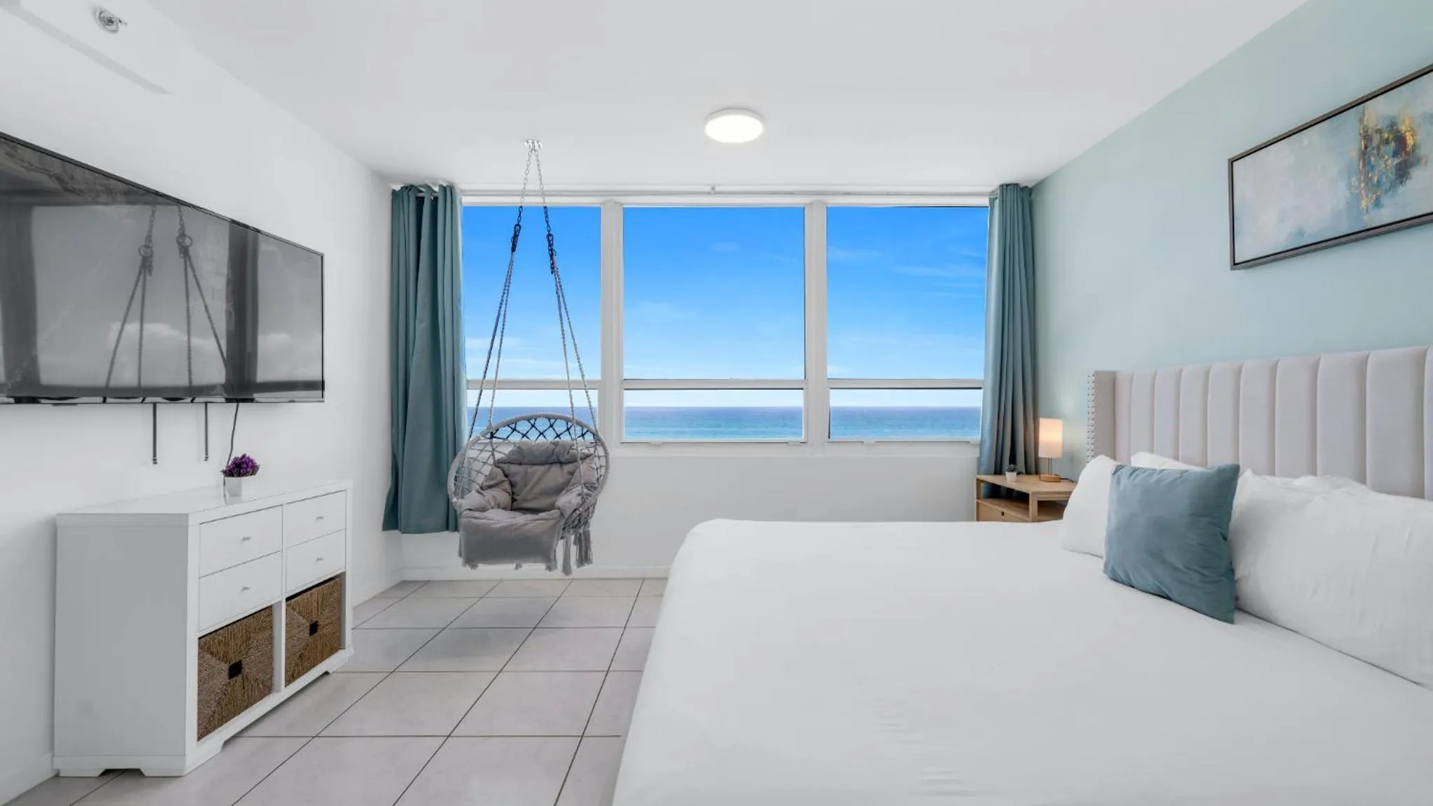 Bed in SeaStays Apartments