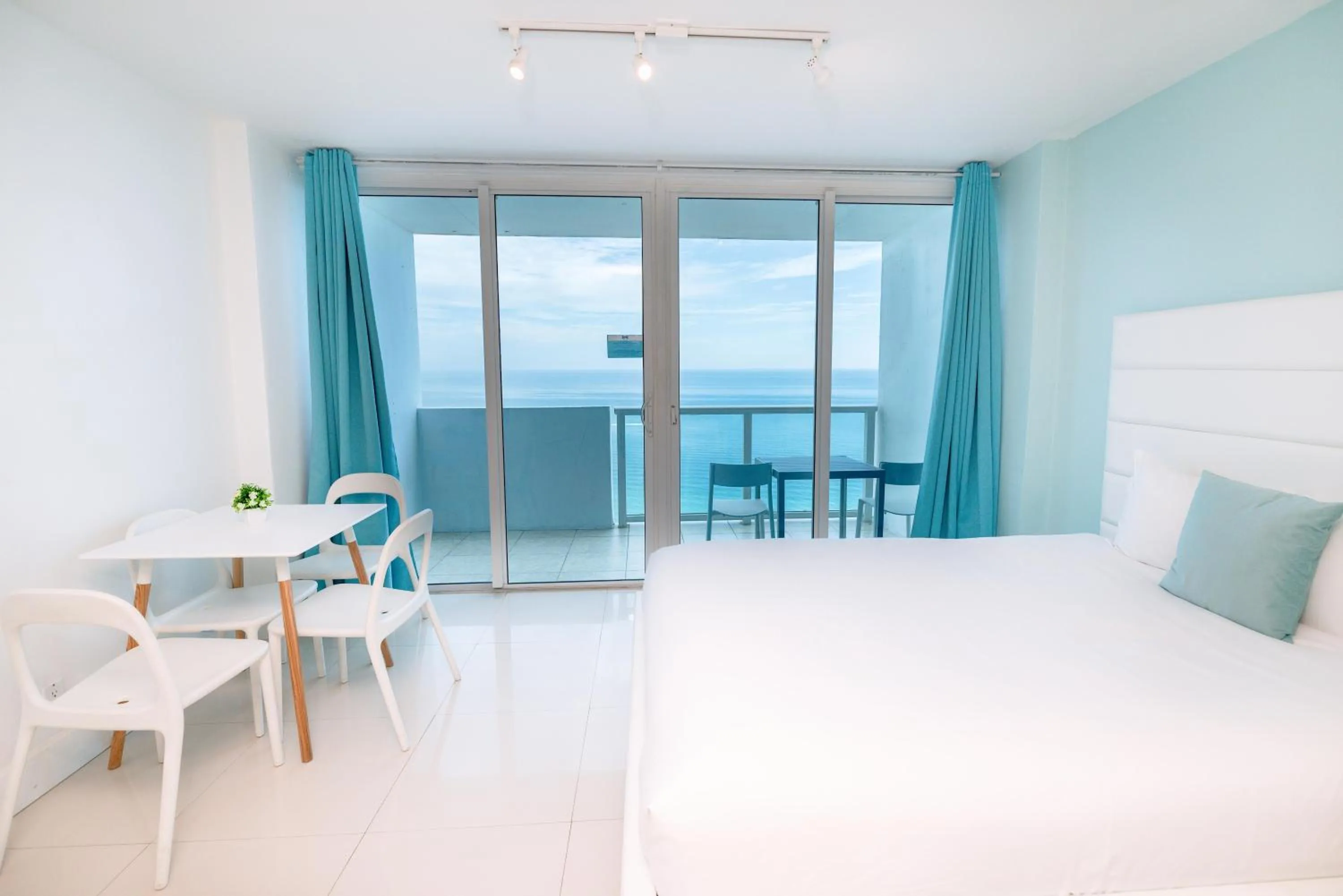 Bed in SeaStays Apartments