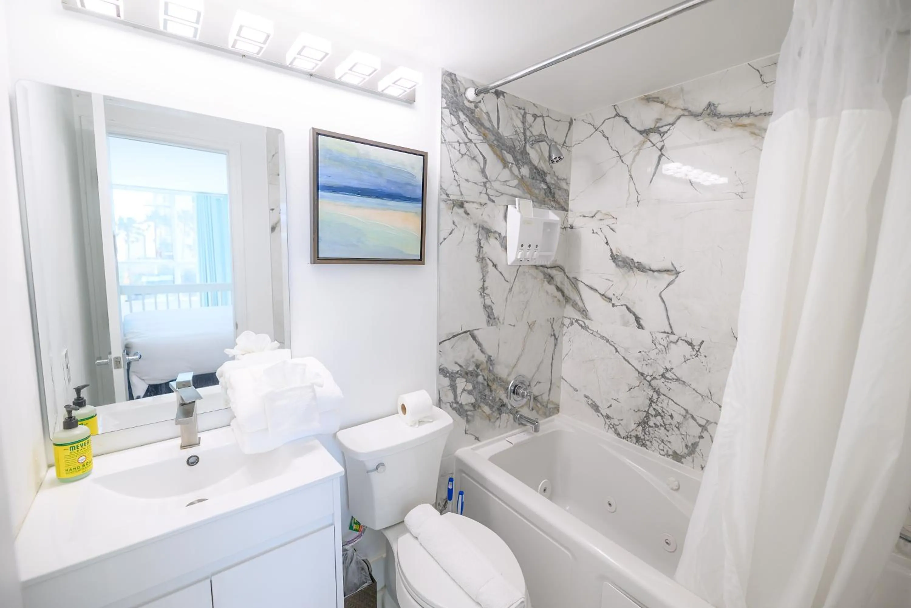 Shower in SeaStays Apartments