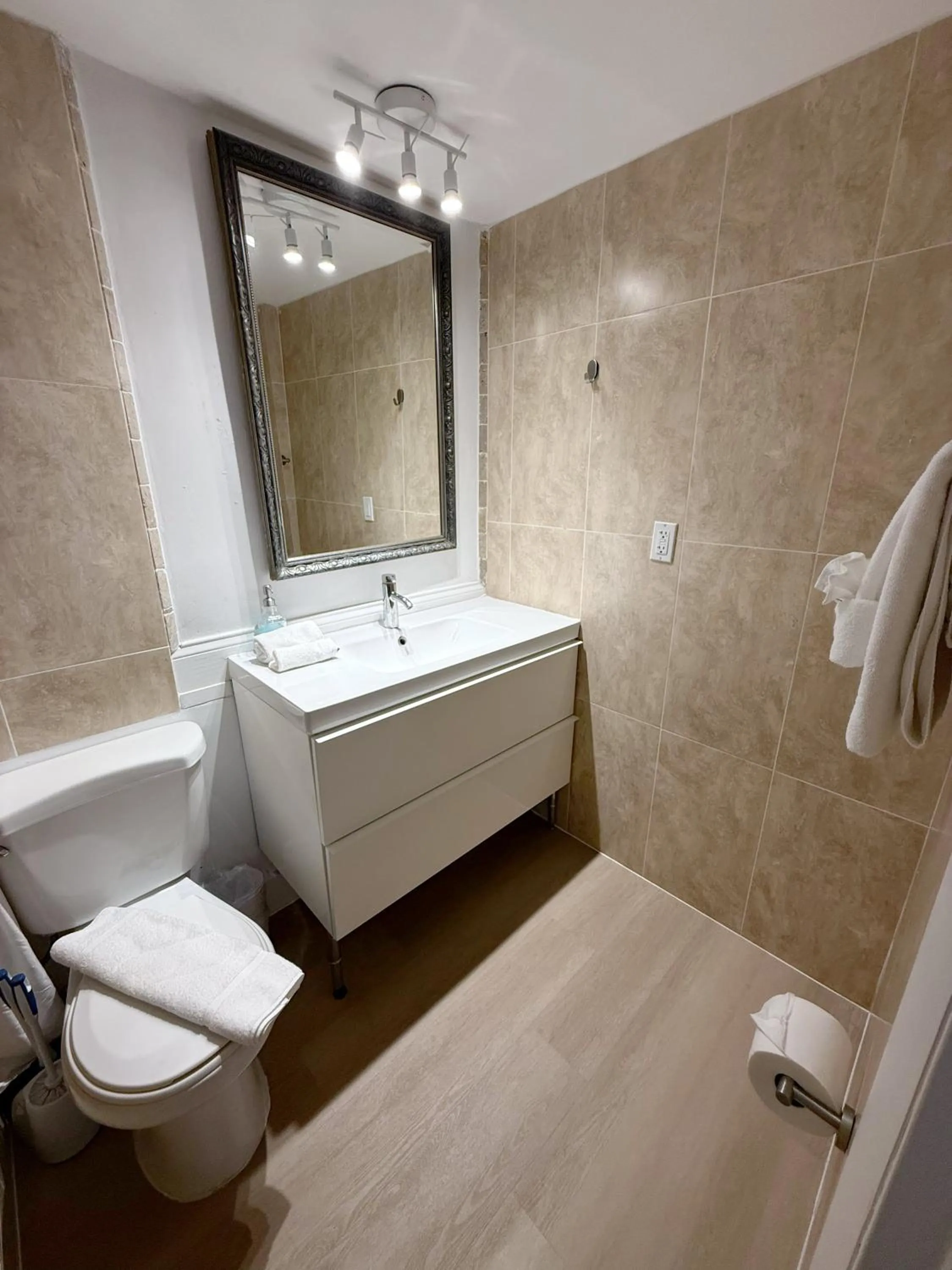 Shower in SeaStays Apartments