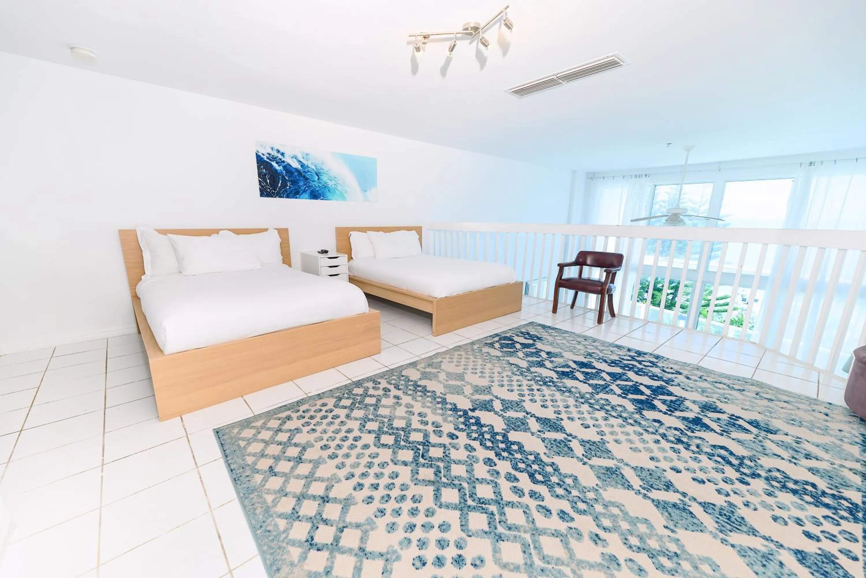 Bed in SeaStays Apartments