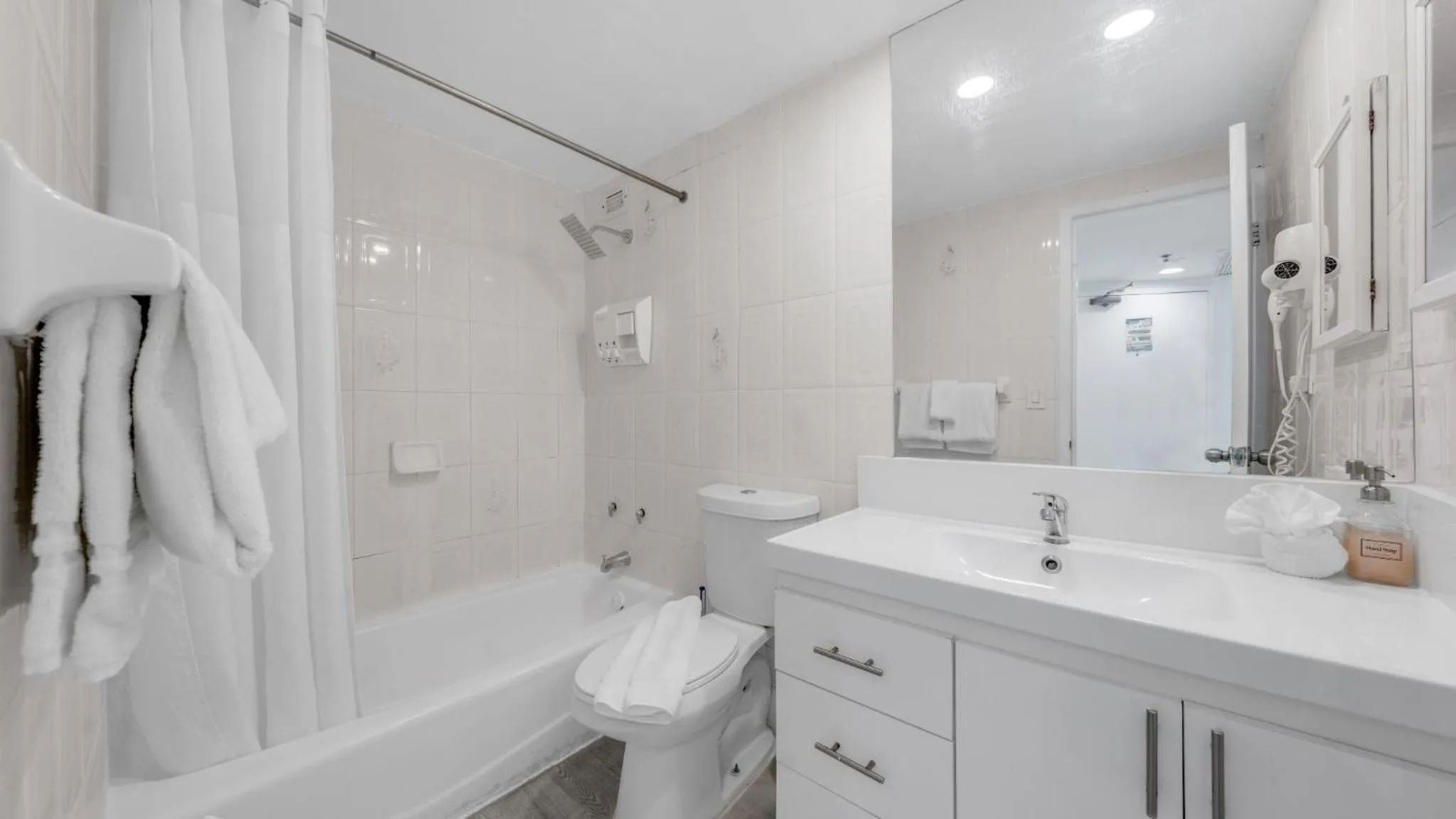 Shower in SeaStays Apartments