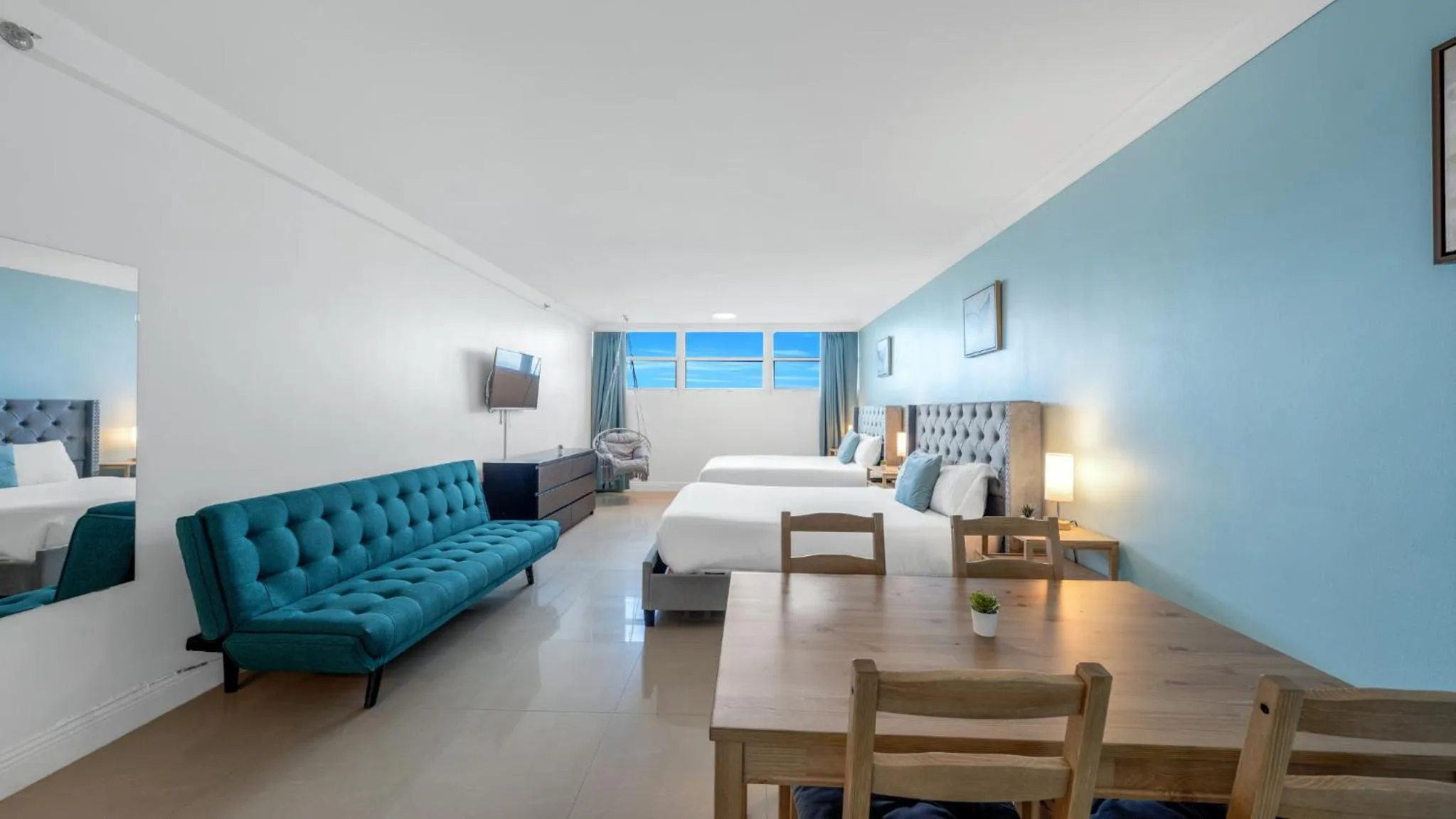 Bed in SeaStays Apartments