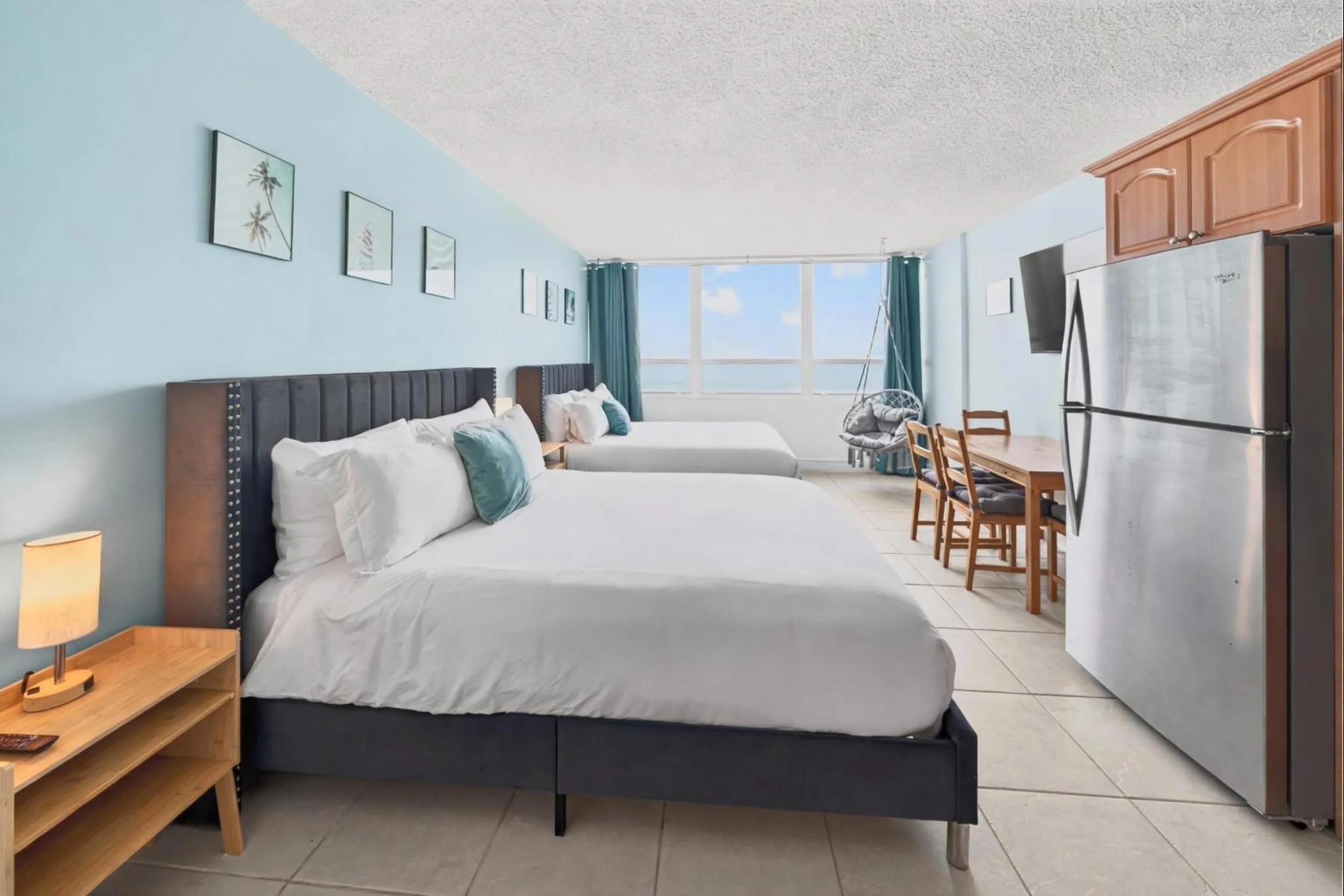 Bed in SeaStays Apartments