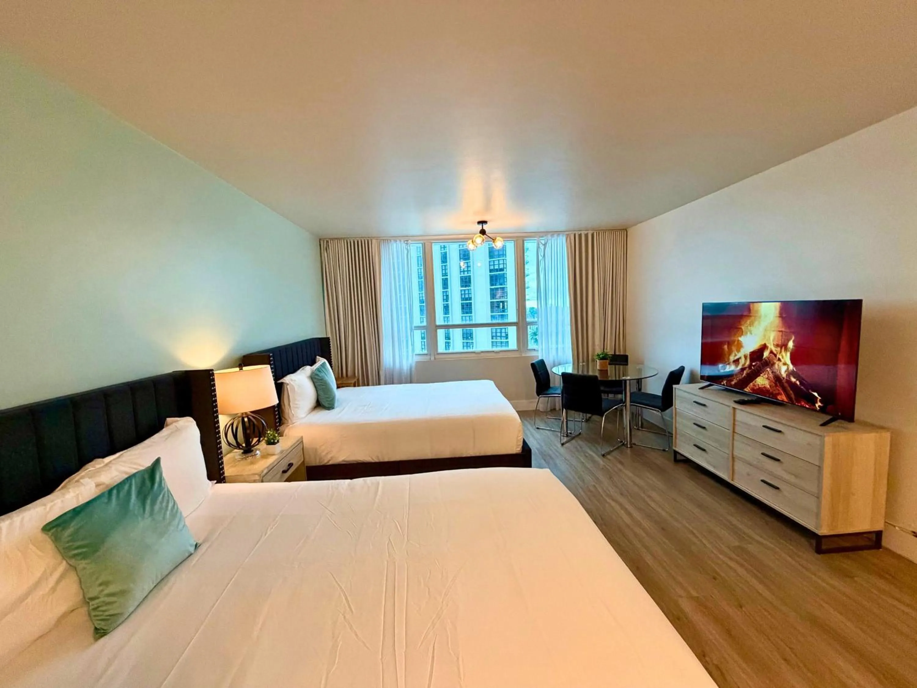 Bed in SeaStays Apartments