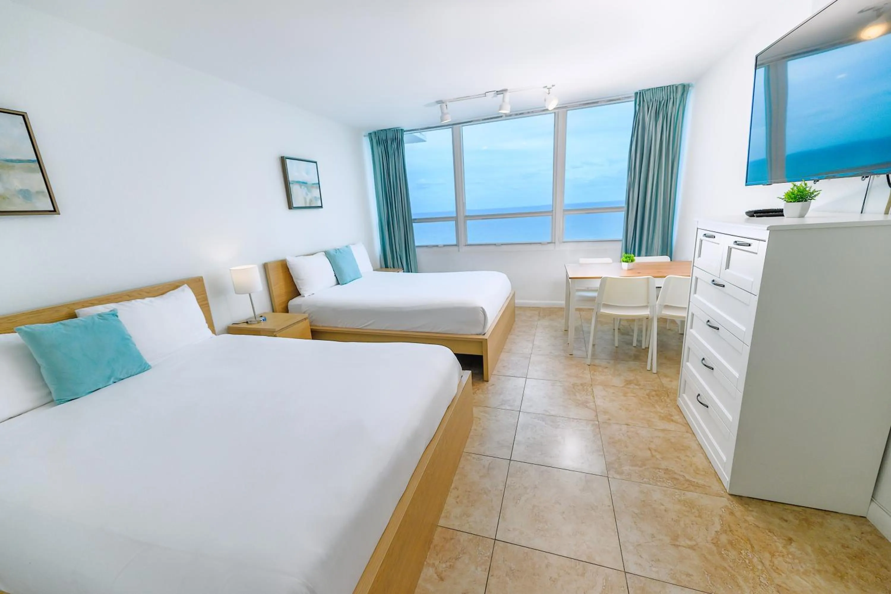 Bed in SeaStays Apartments