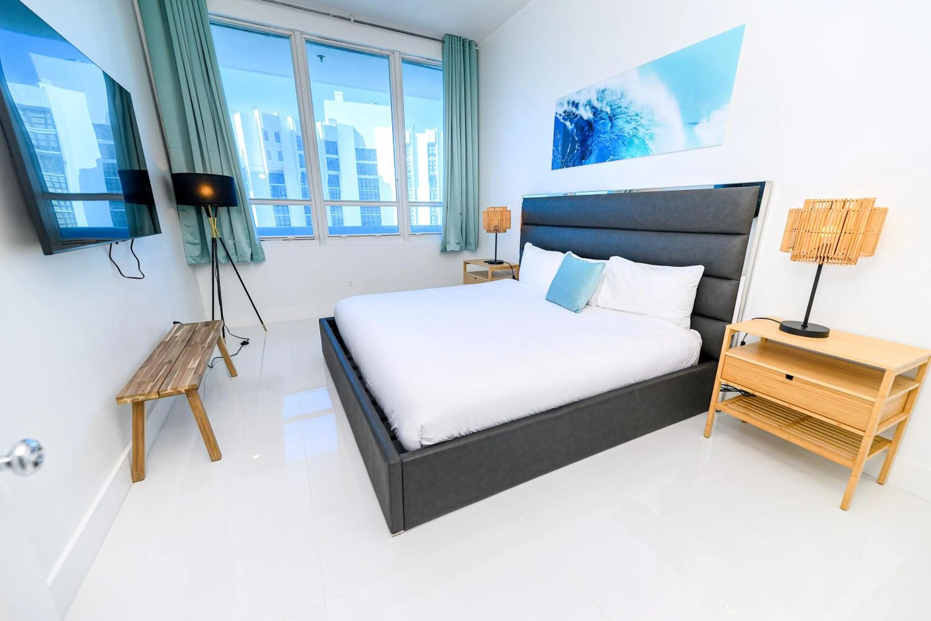 Bed in SeaStays Apartments