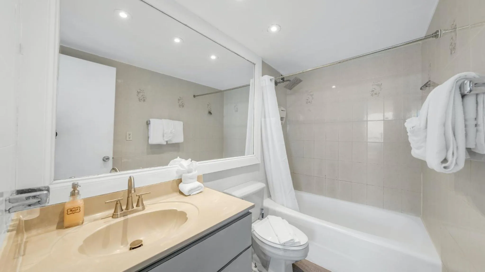 Shower in SeaStays Apartments