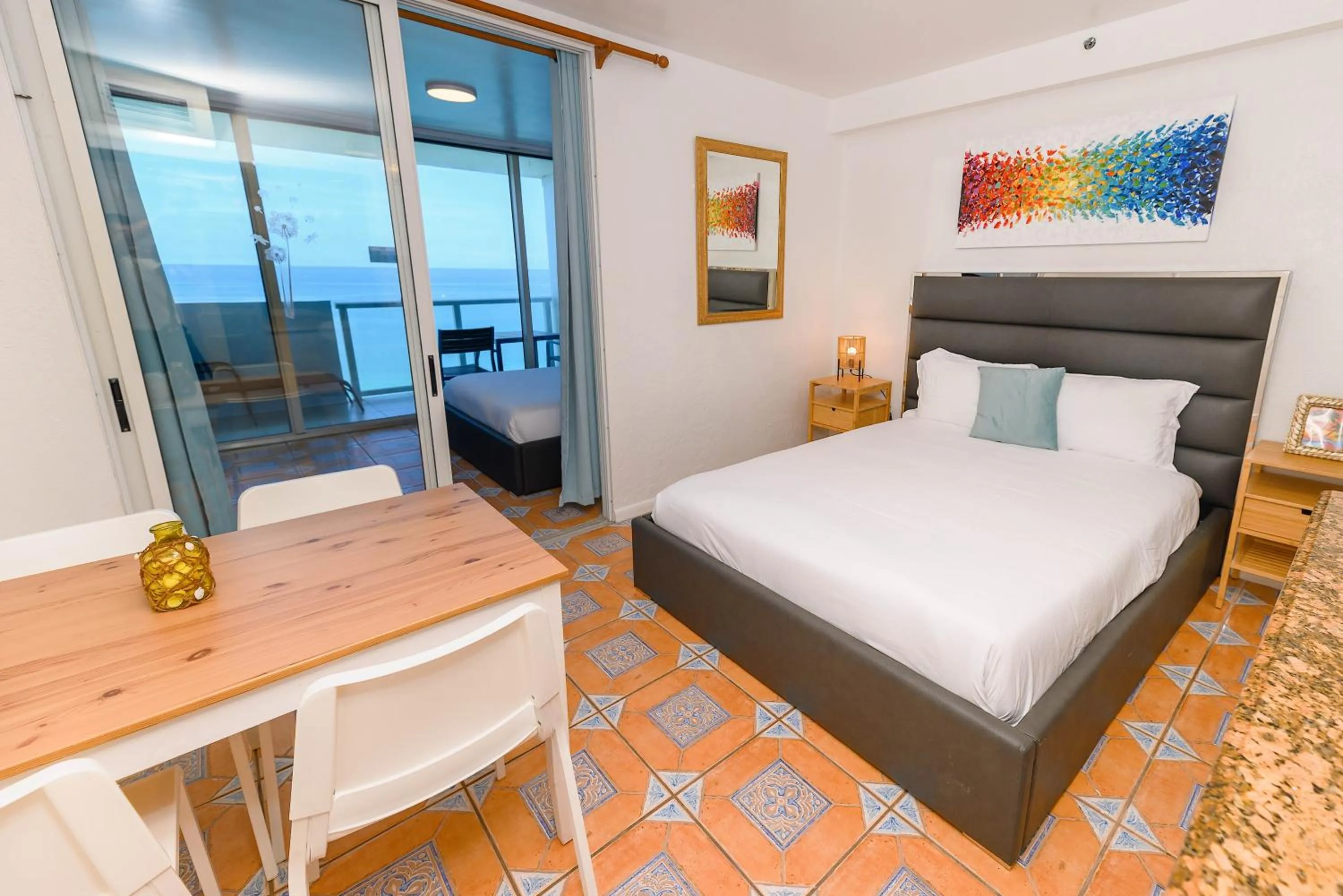 Bed in SeaStays Apartments