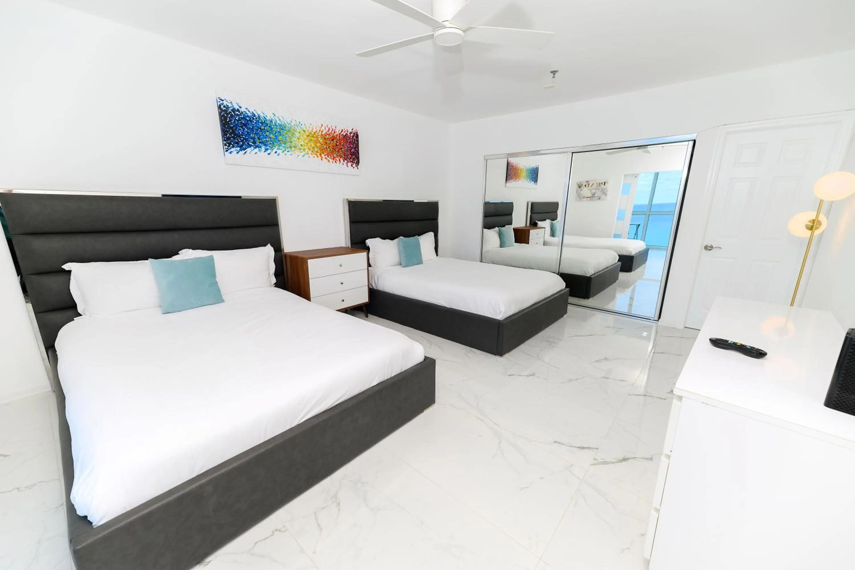 Bed in SeaStays Apartments