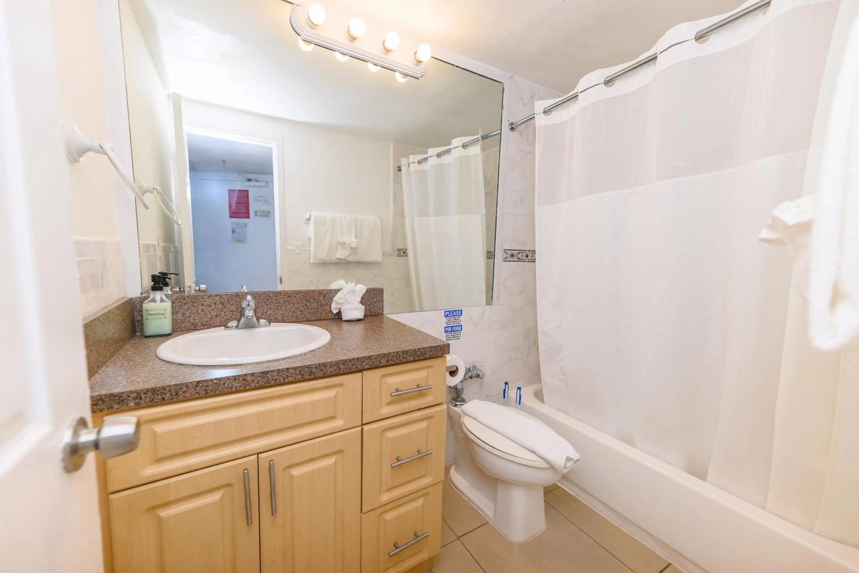 Shower in SeaStays Apartments