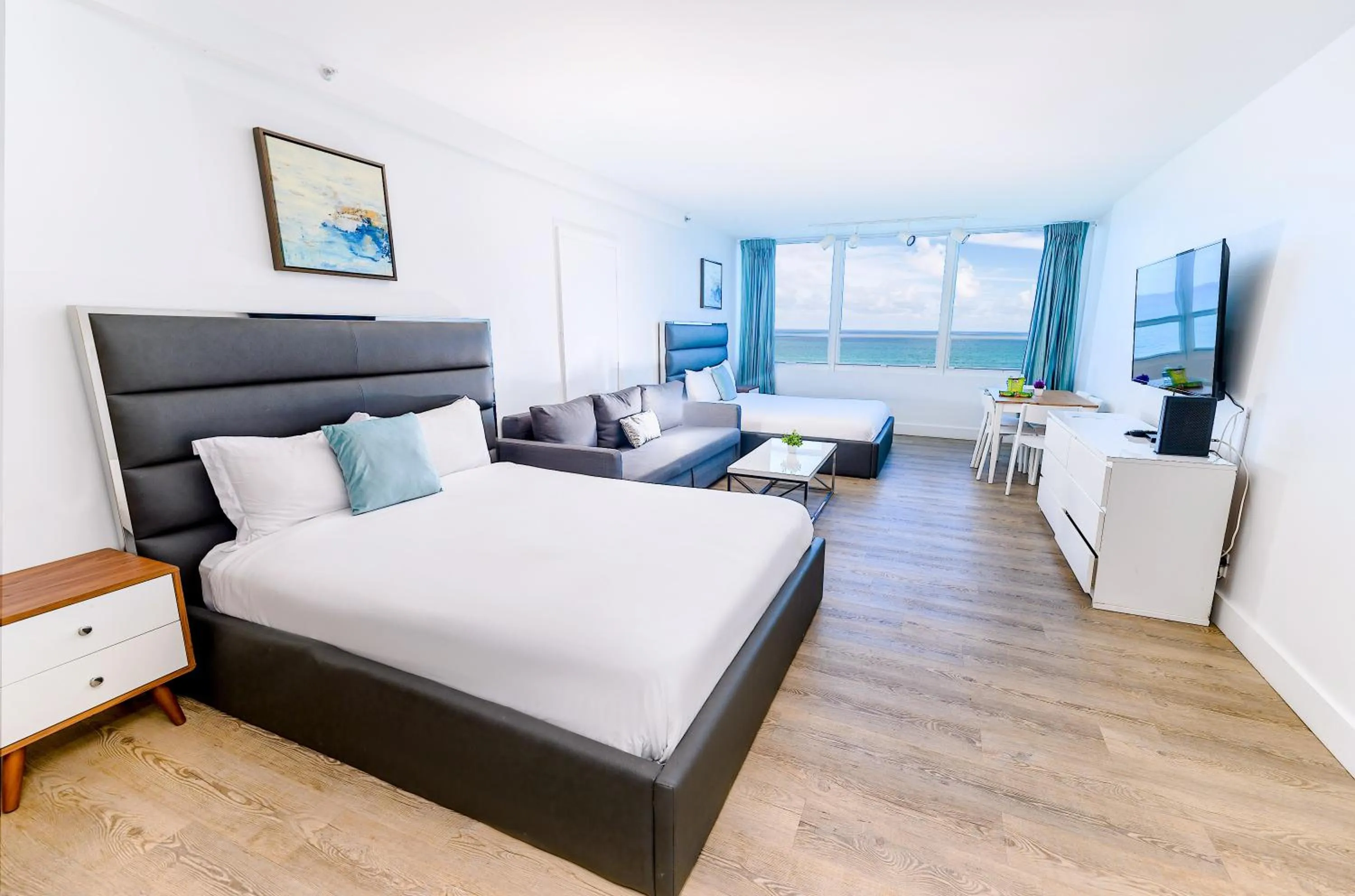 Bed in SeaStays Apartments