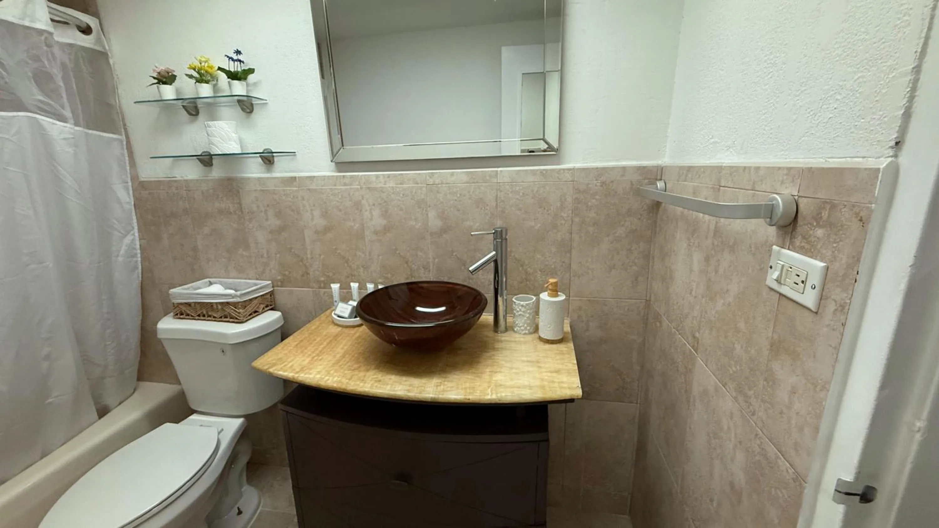 Shower in SeaStays Apartments