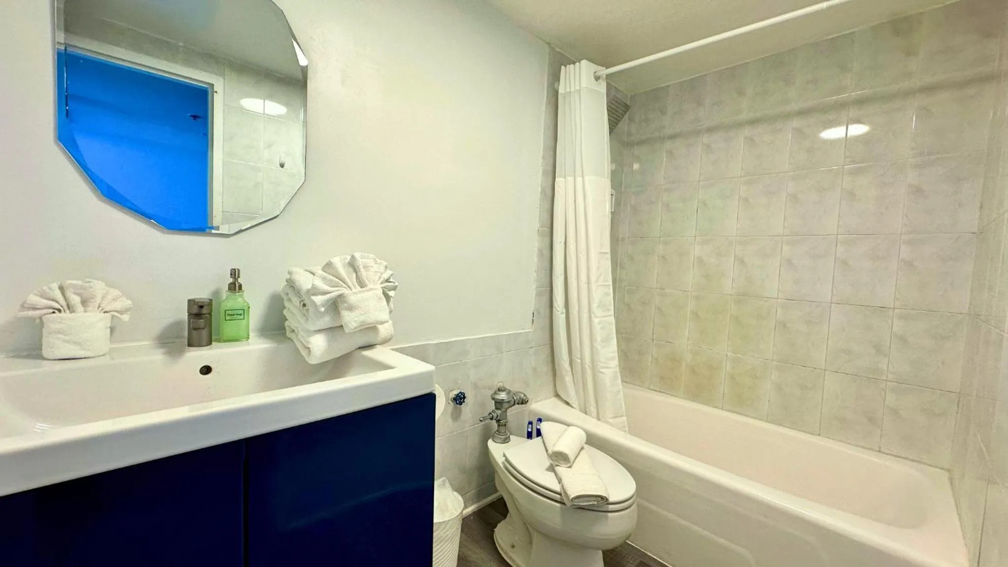 Shower in SeaStays Apartments