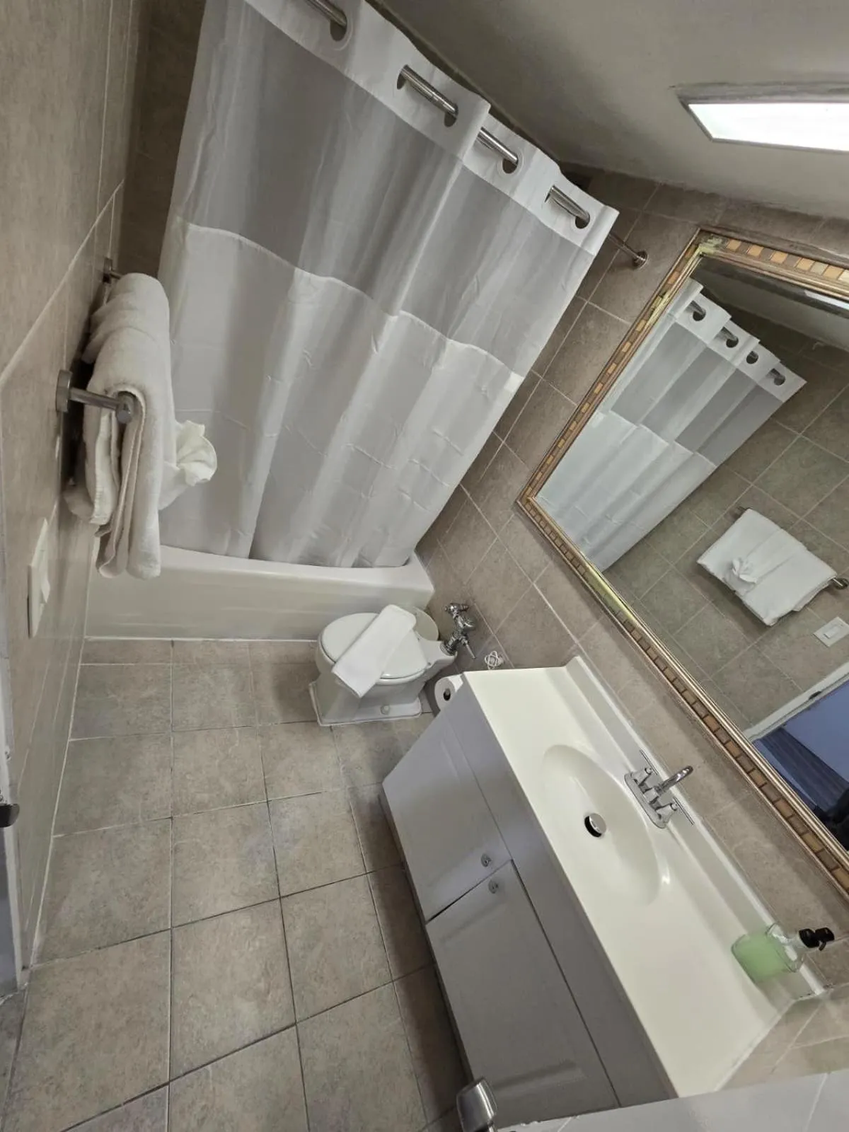 Shower in SeaStays Apartments