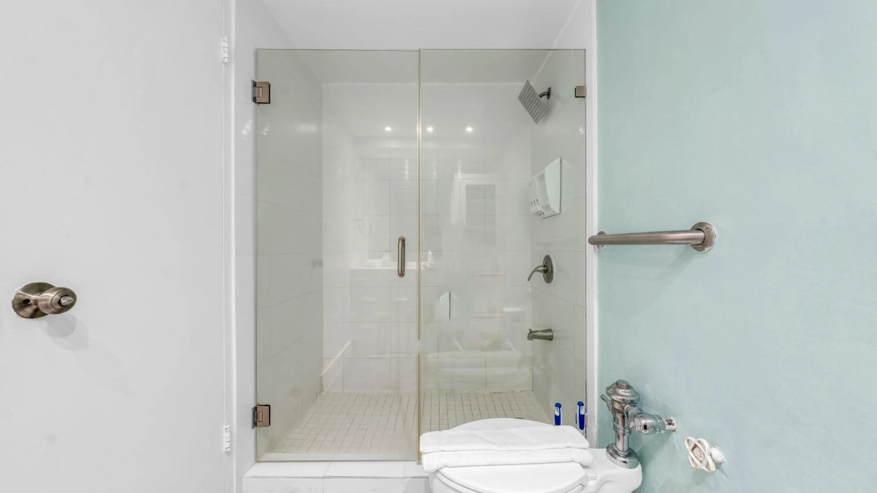 Shower in SeaStays Apartments