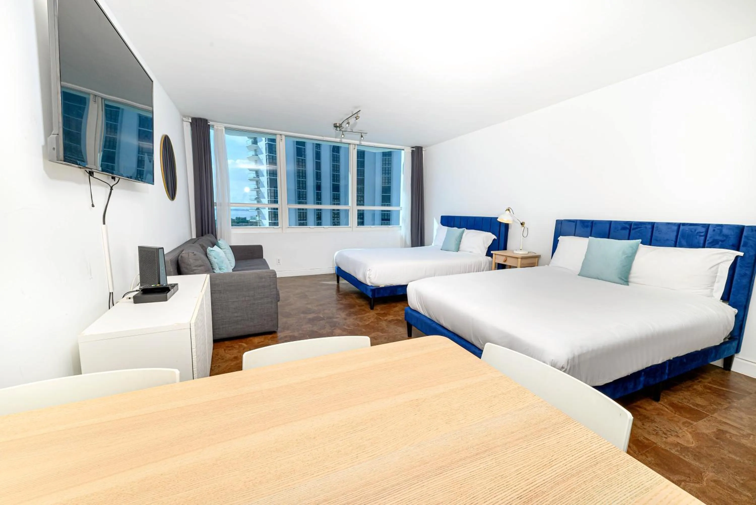 Bed in SeaStays Apartments