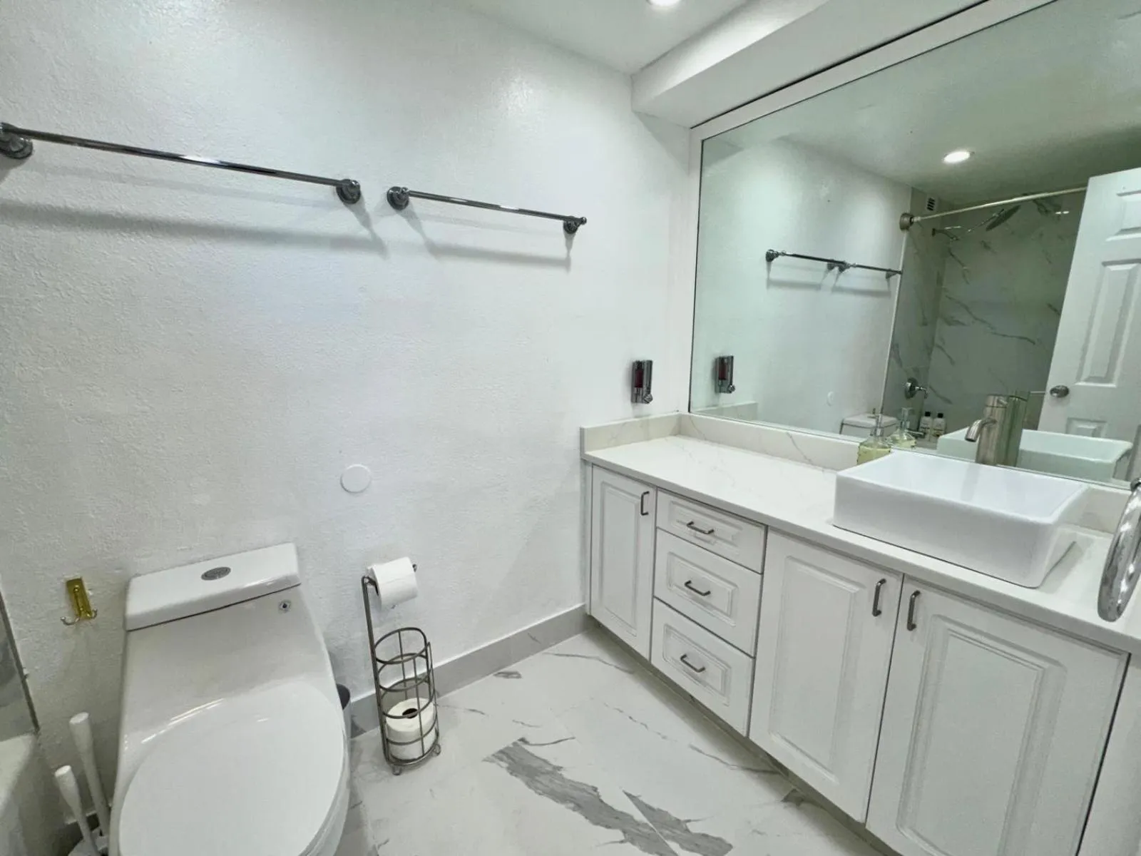 Shower in SeaStays Apartments