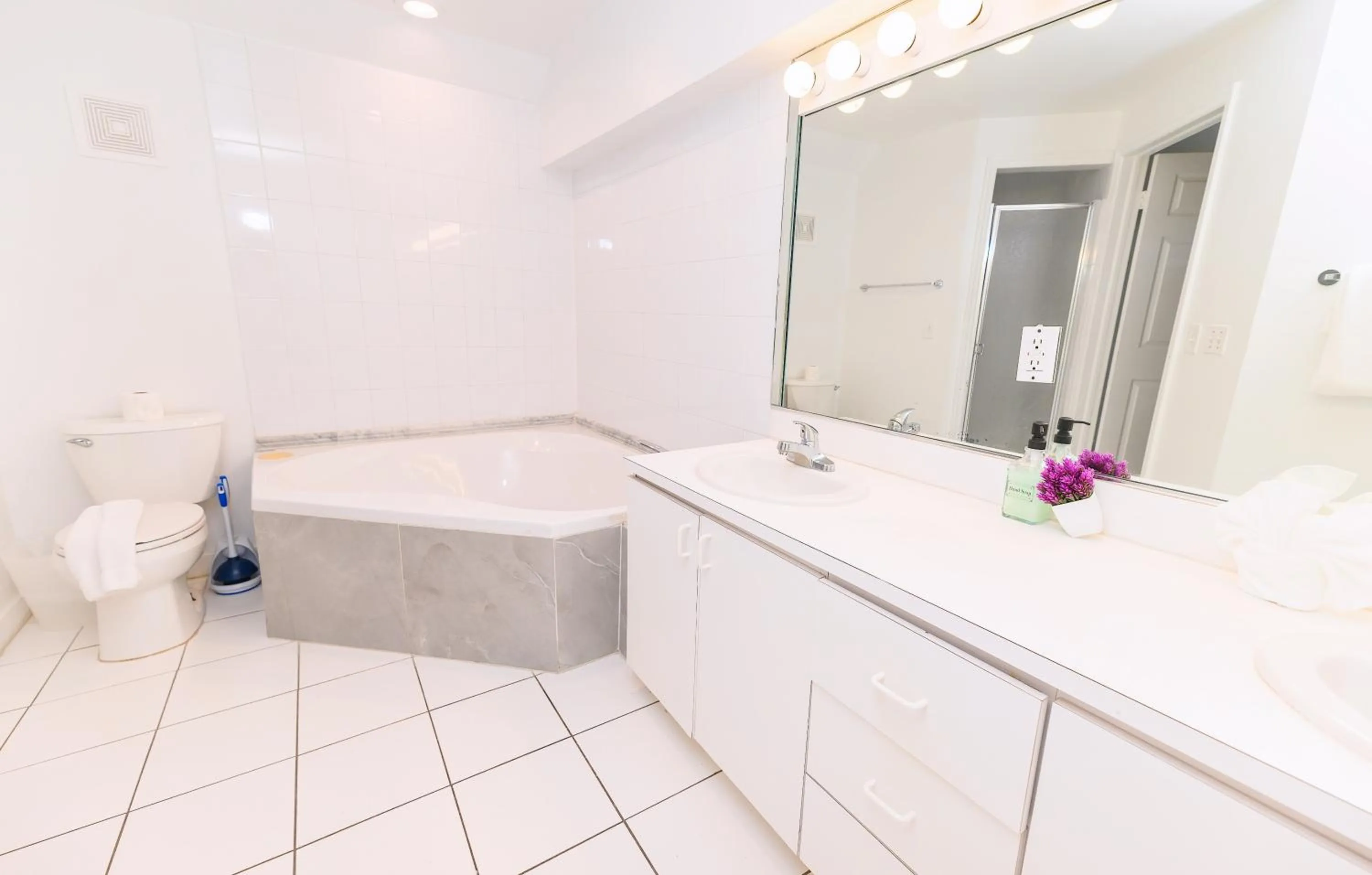 Shower in SeaStays Apartments