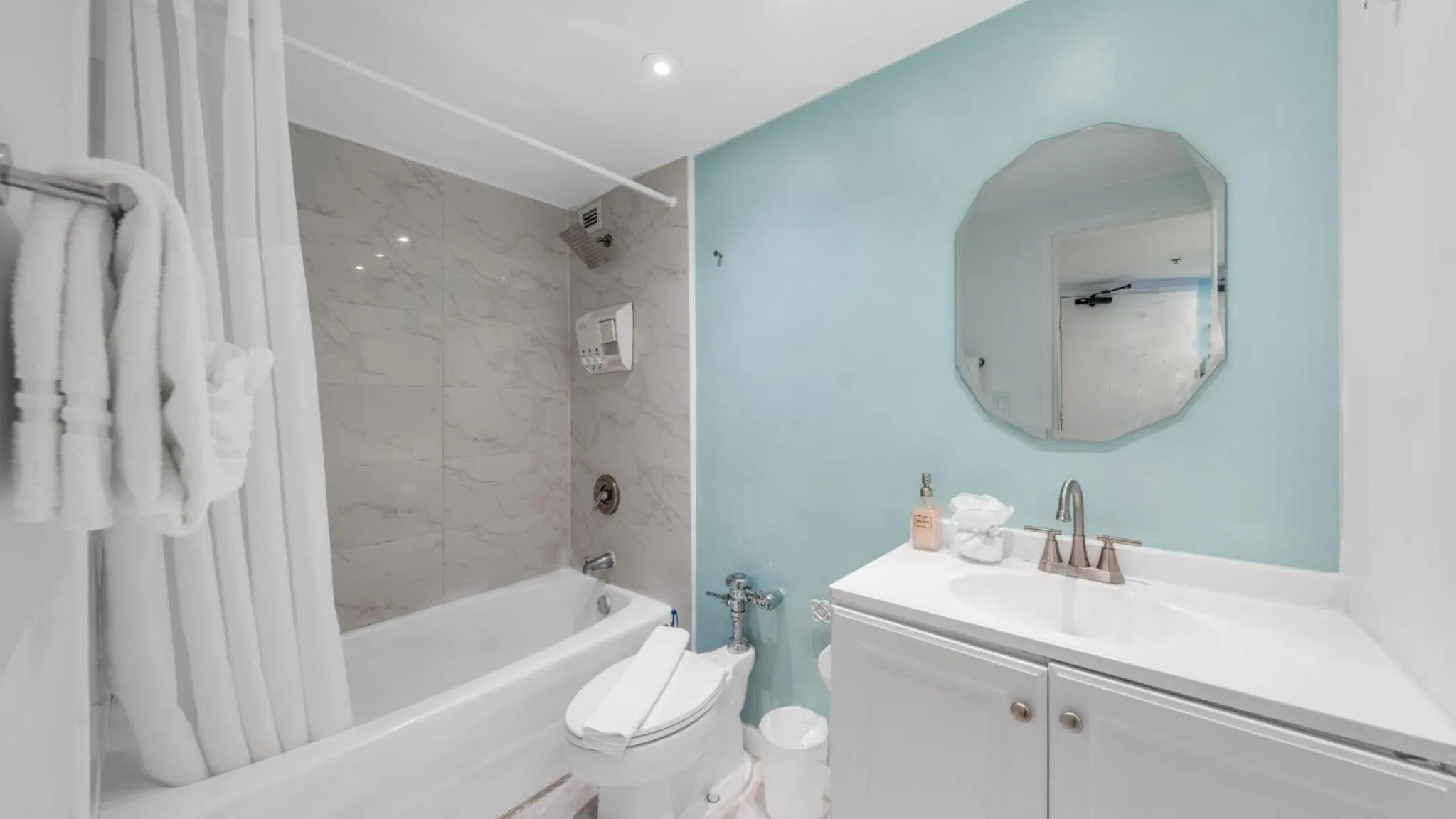 Shower in SeaStays Apartments