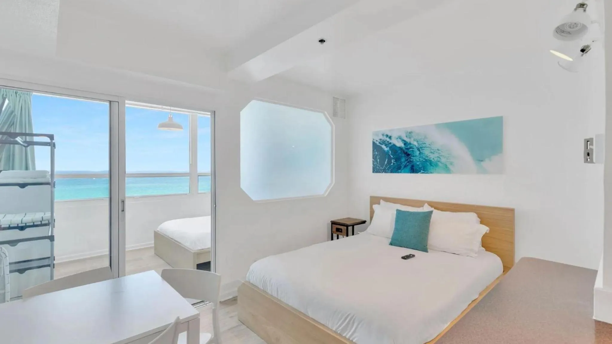 Bed in SeaStays Apartments