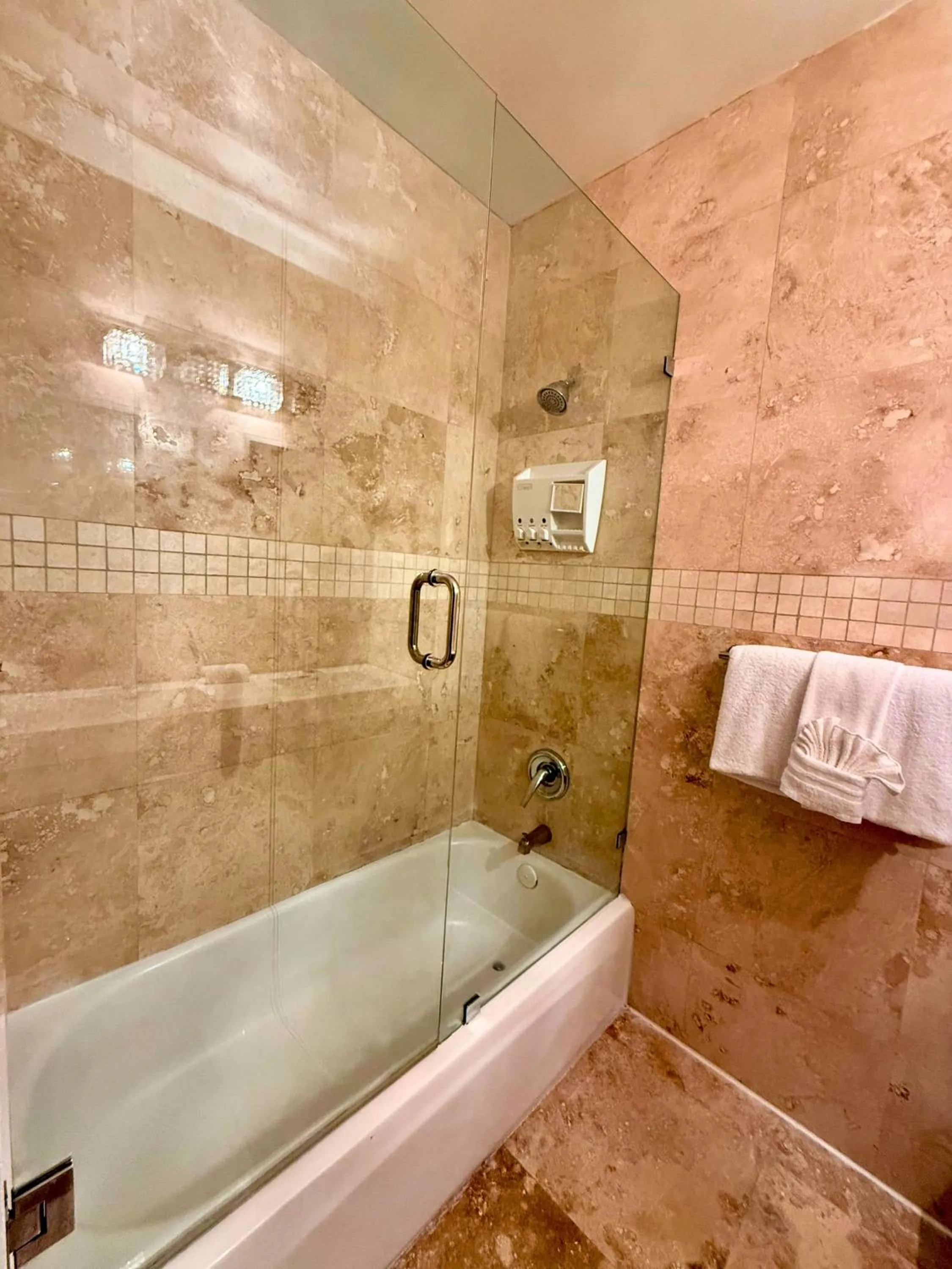 Shower in SeaStays Apartments