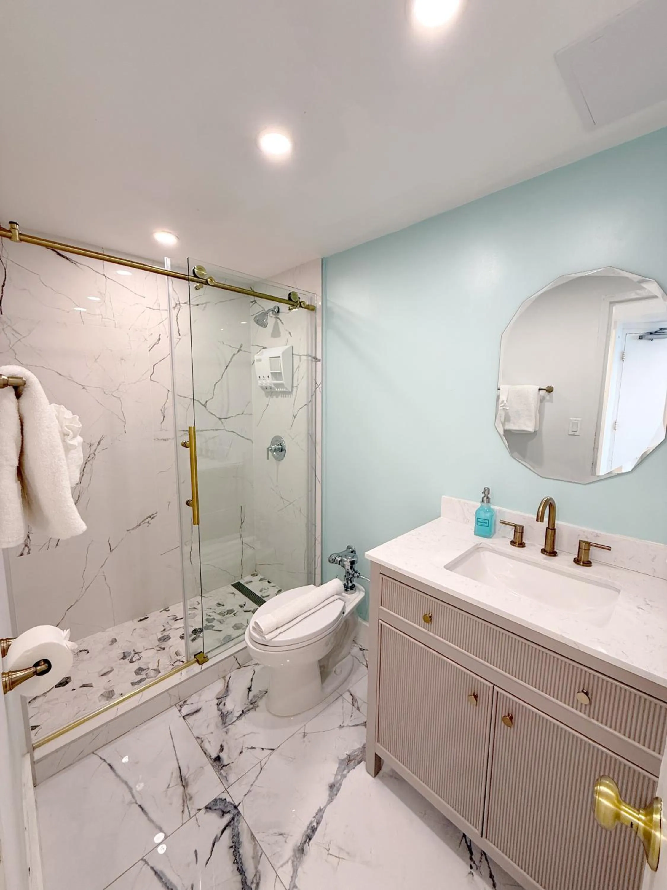 Shower in SeaStays Apartments