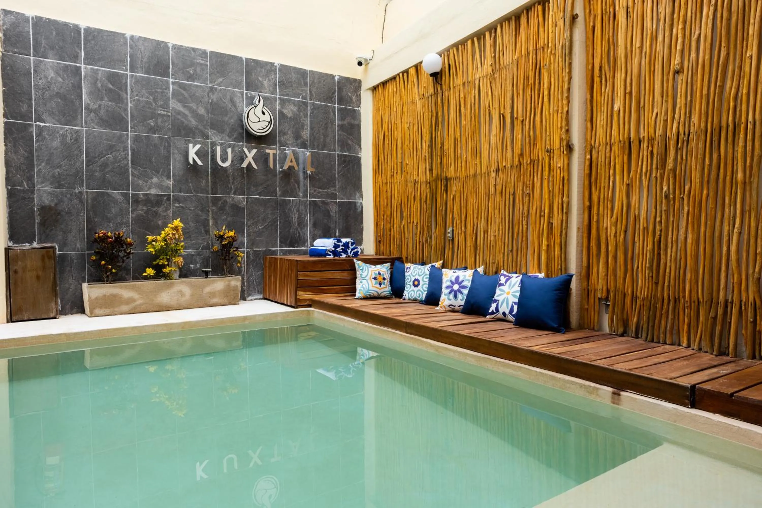 Suite 1 king, sofa bed, dining room, mini-bar, microwave, coffee maker in Kuxtal Hotel Boutique
