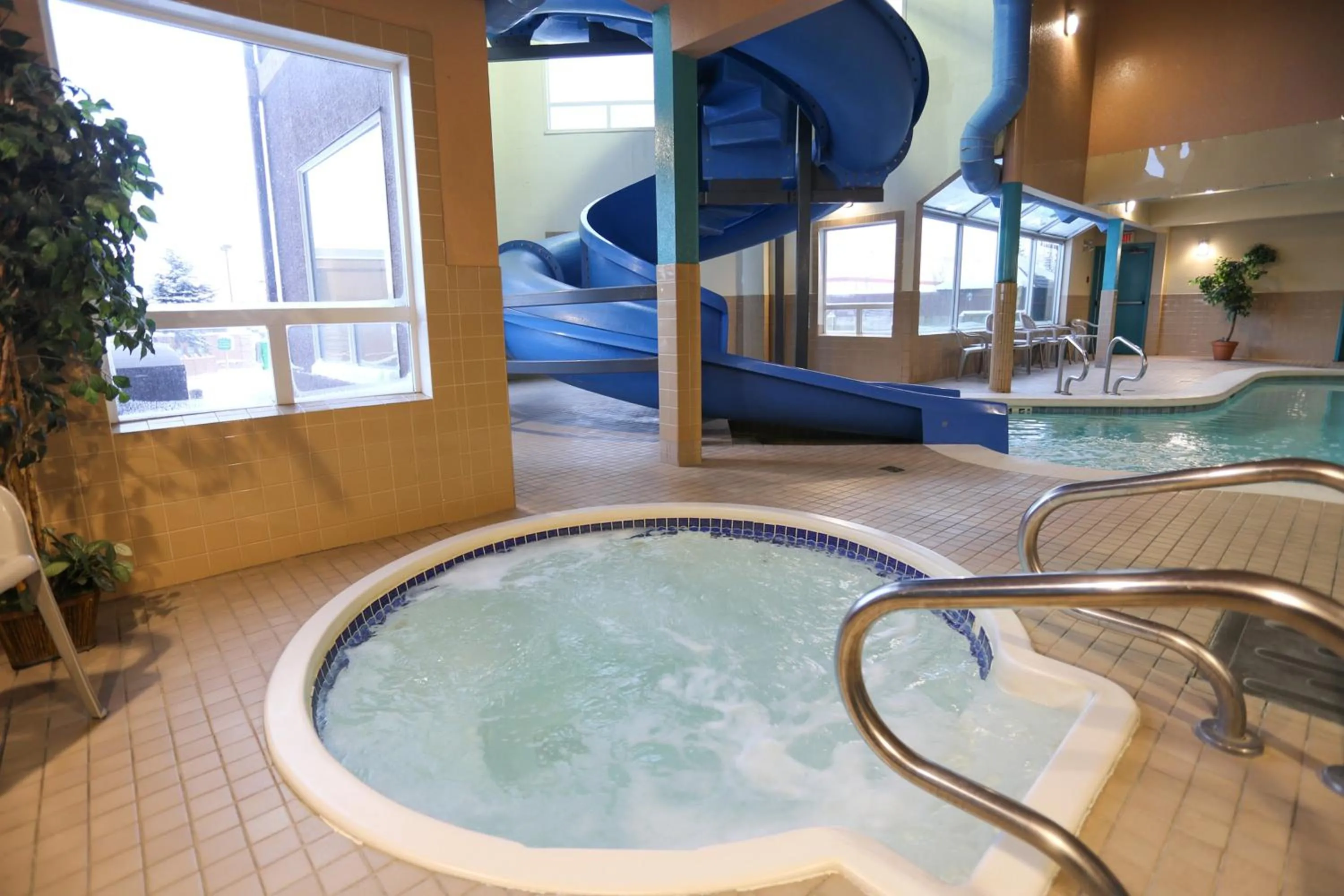 Swimming pool in Prairie Crest Calgary Airport by IHG