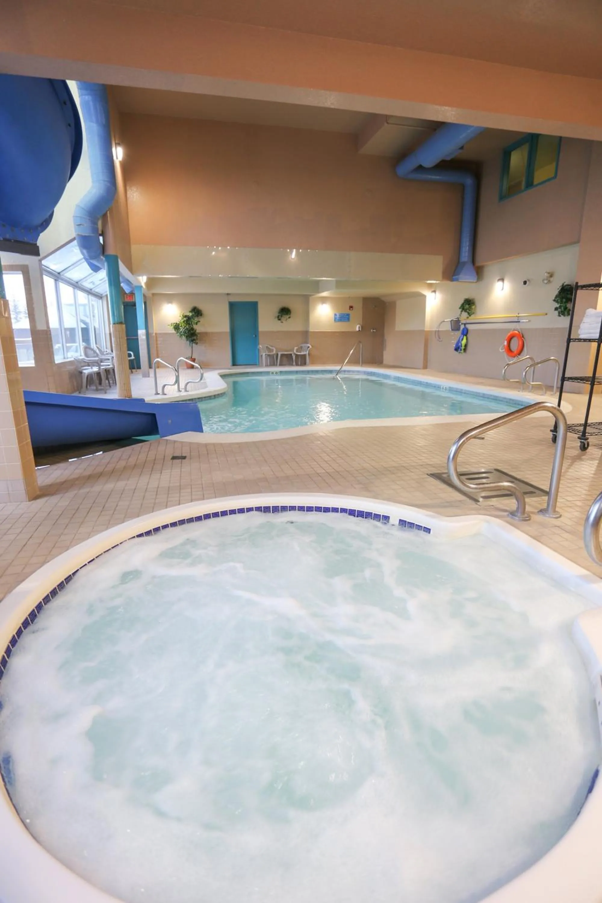 Swimming pool in Prairie Crest Calgary Airport by IHG