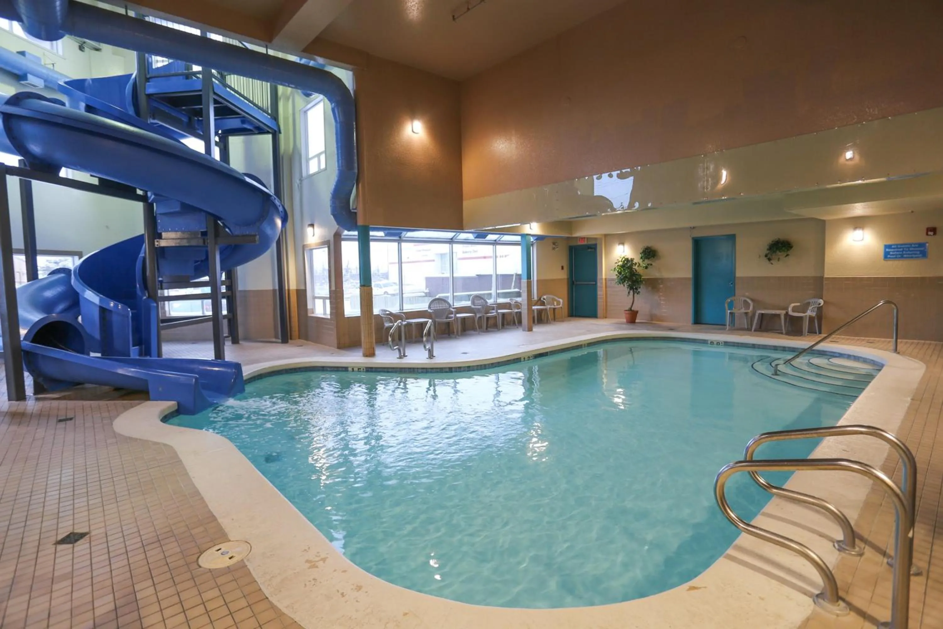 Swimming pool in Prairie Crest Calgary Airport by IHG