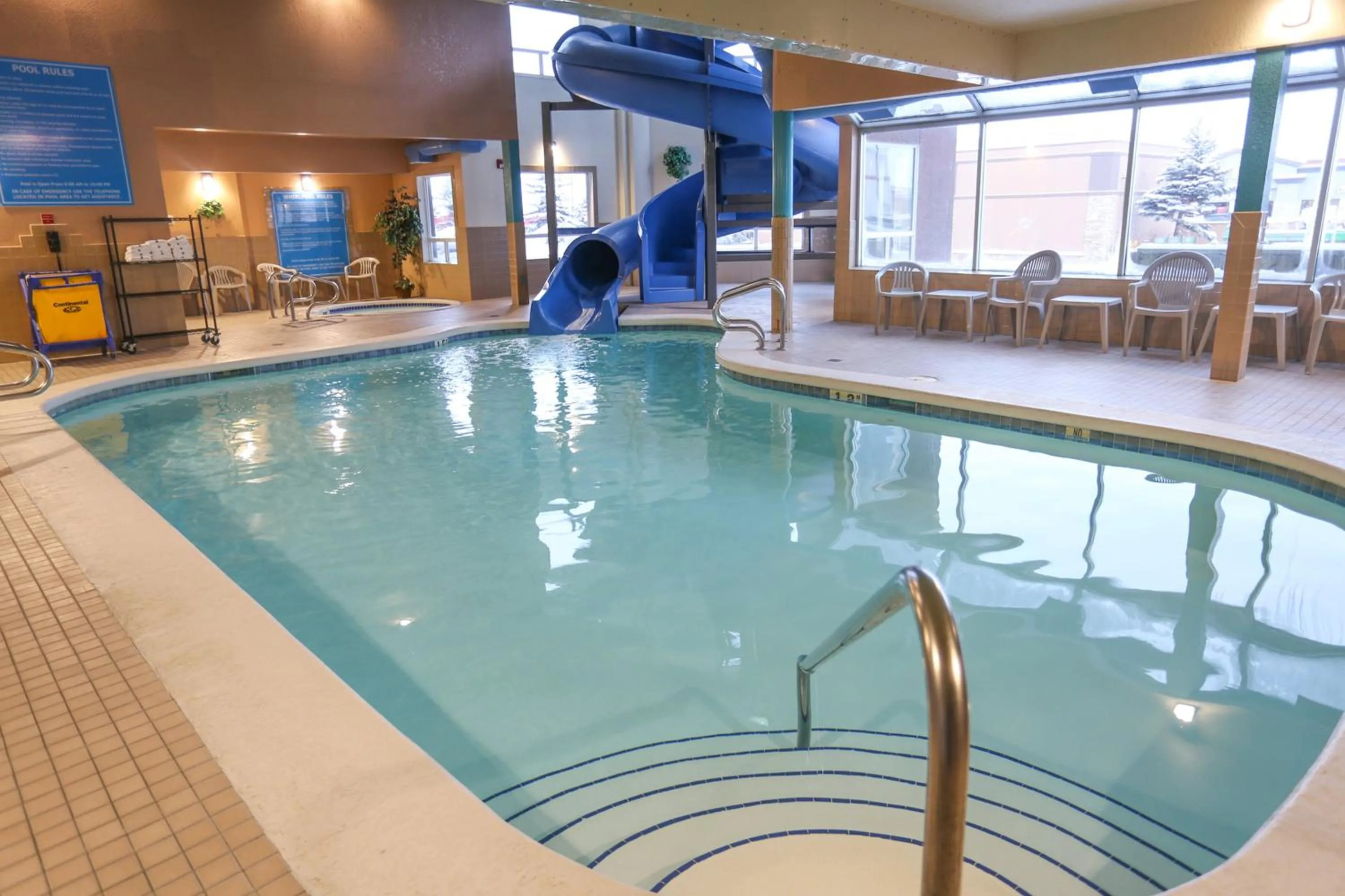 Swimming pool in Prairie Crest Calgary Airport by IHG