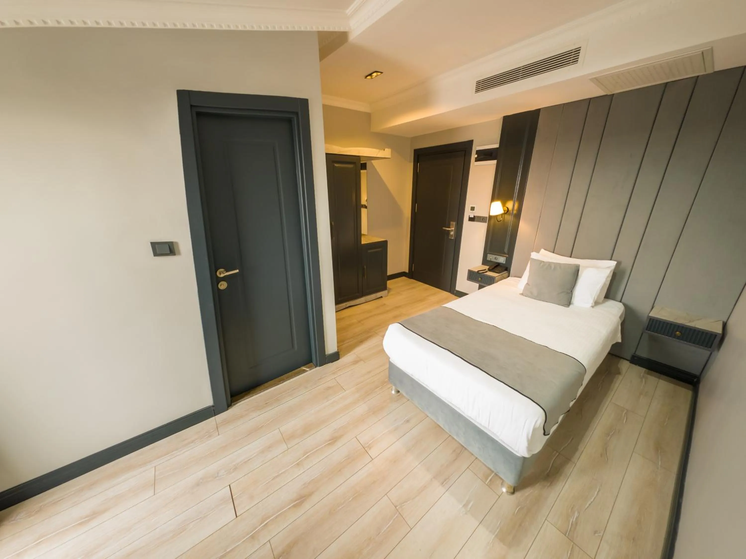 Bed in Express Plus Hotel