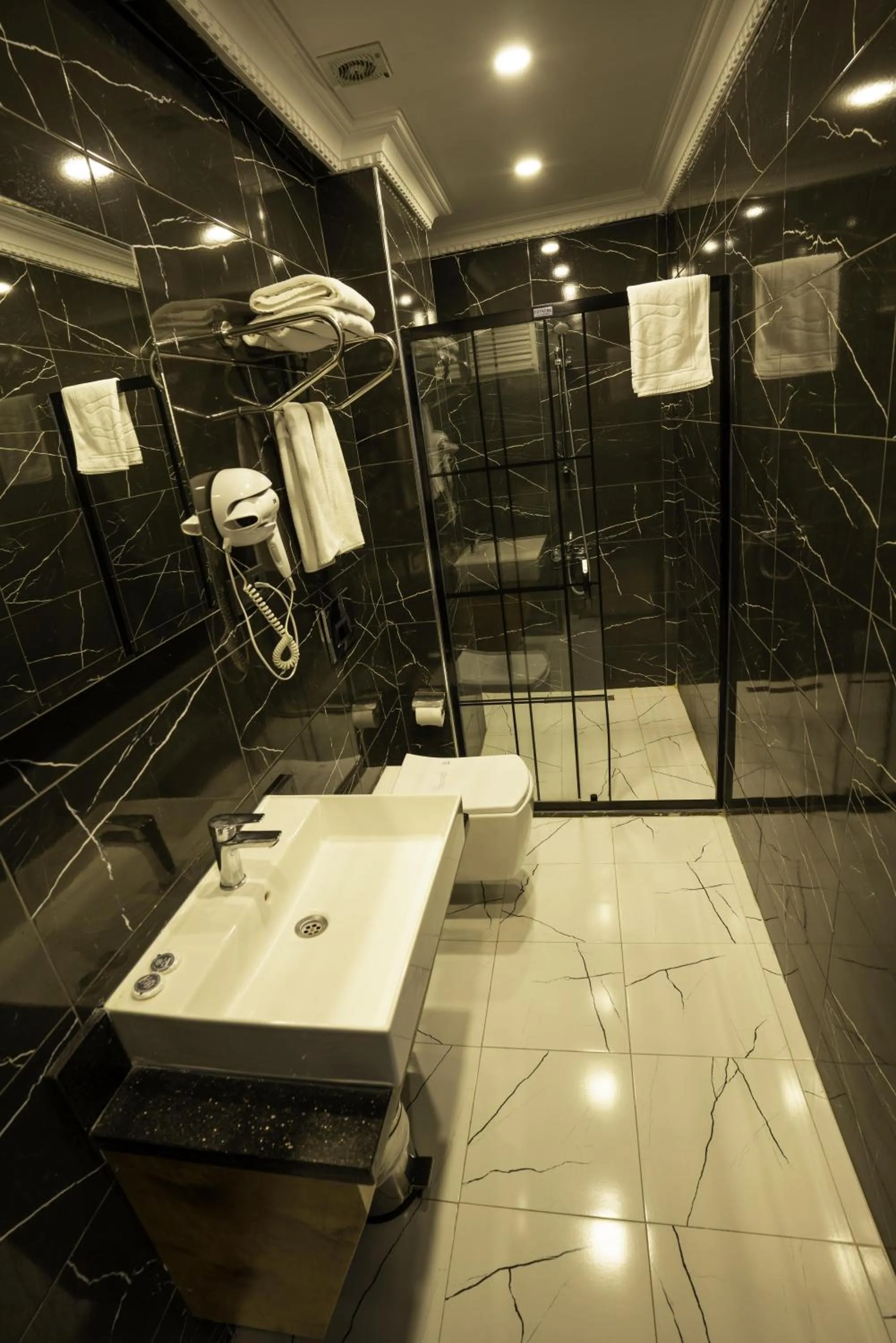 Bathroom in Express Plus Hotel