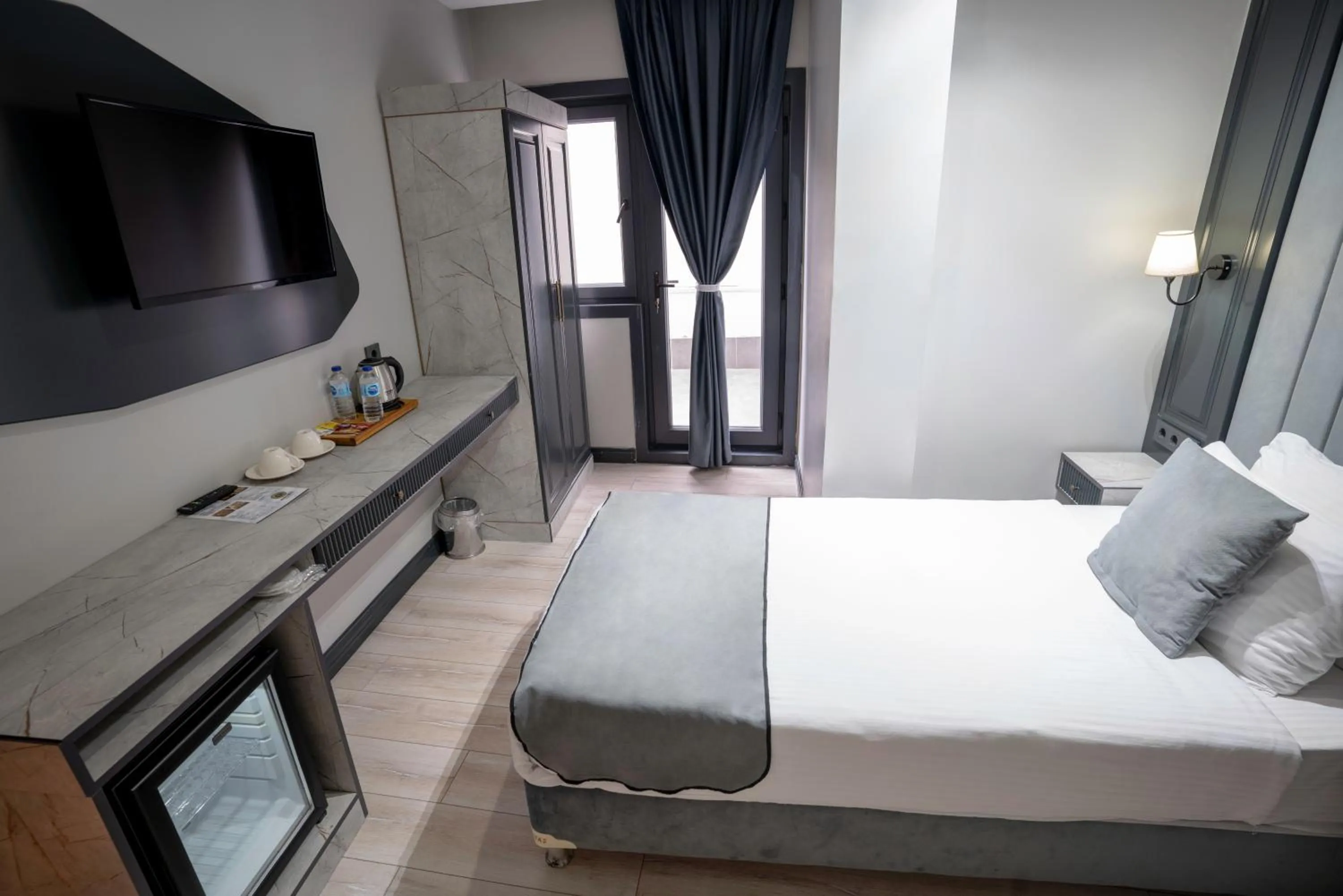 Bed in Express Plus Hotel