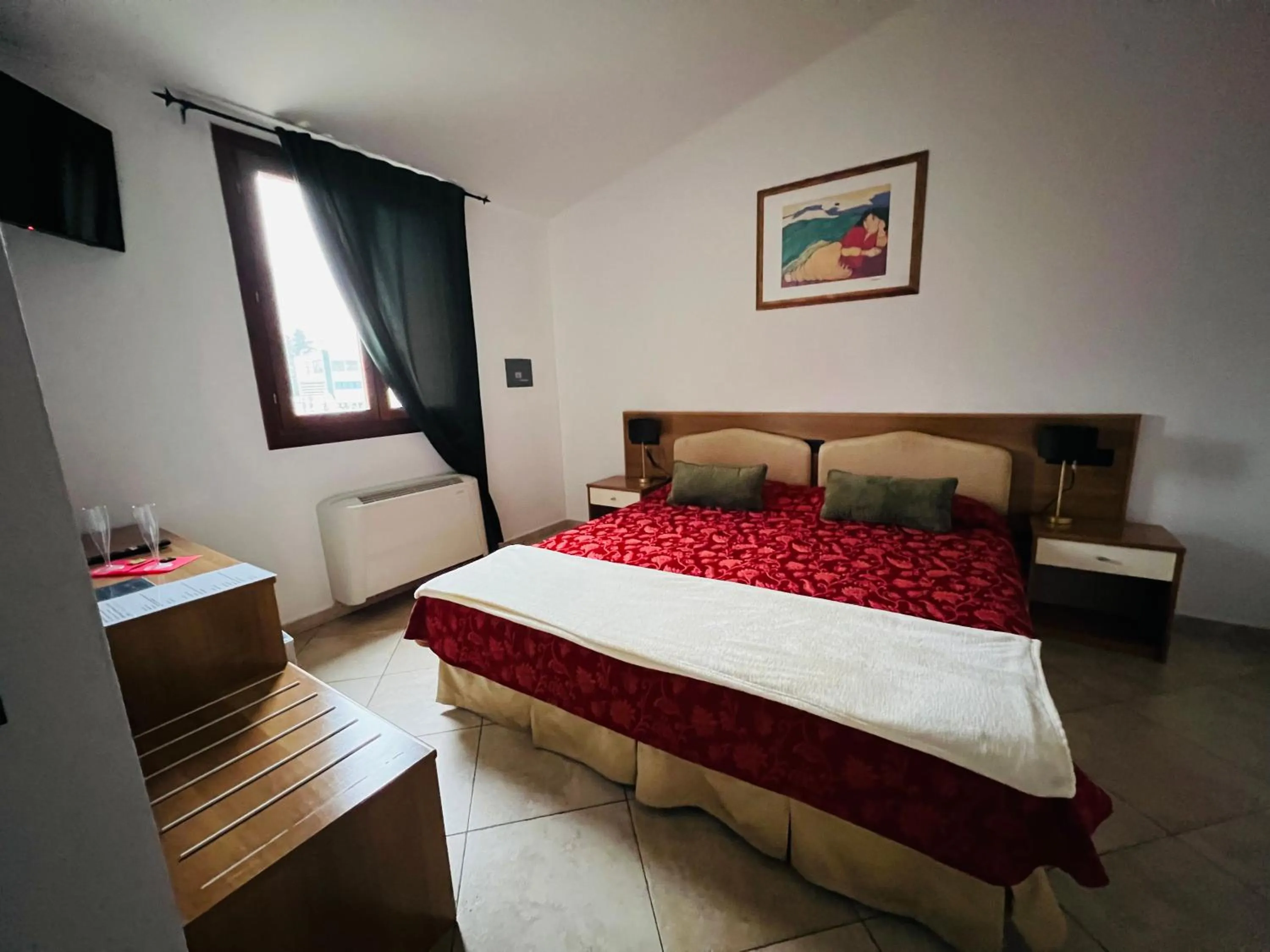 Bed in Hotel Le Corti