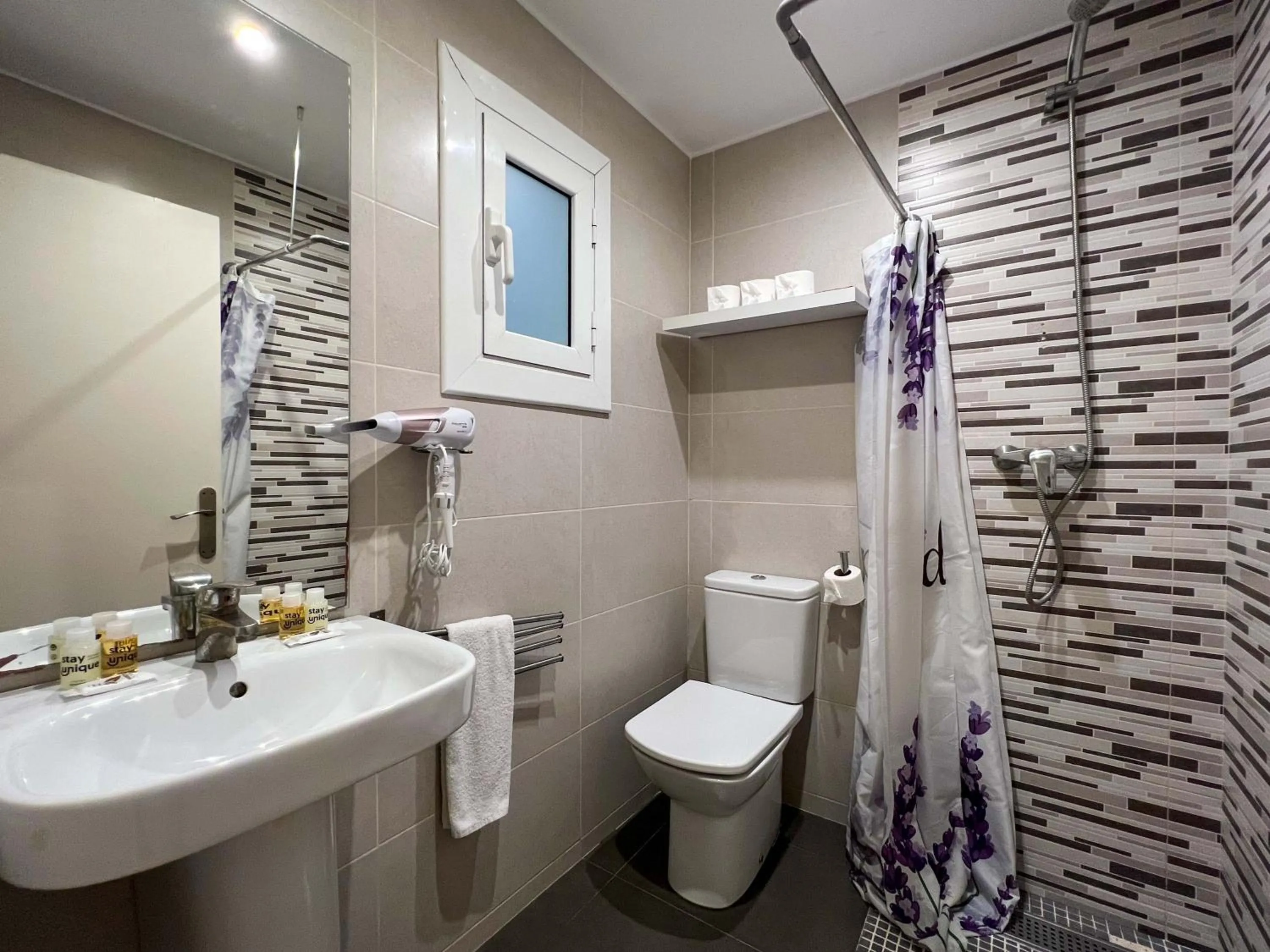 Shower in Stay U-nique Apartments Tordera