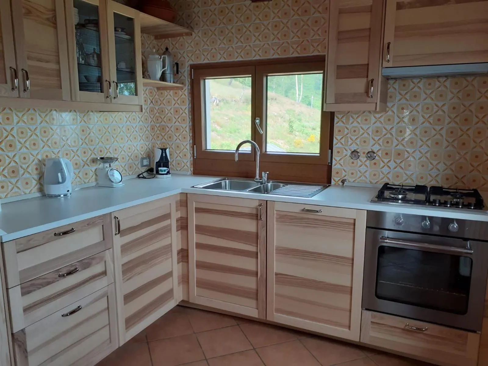 Kitchen or kitchenette in Baita Mael