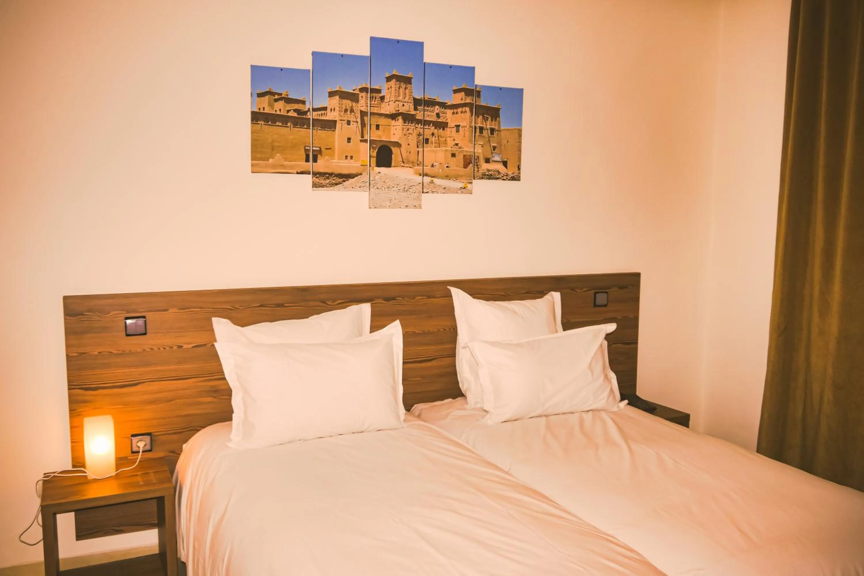 Bed in EL MOUSSAFIR HOTEL