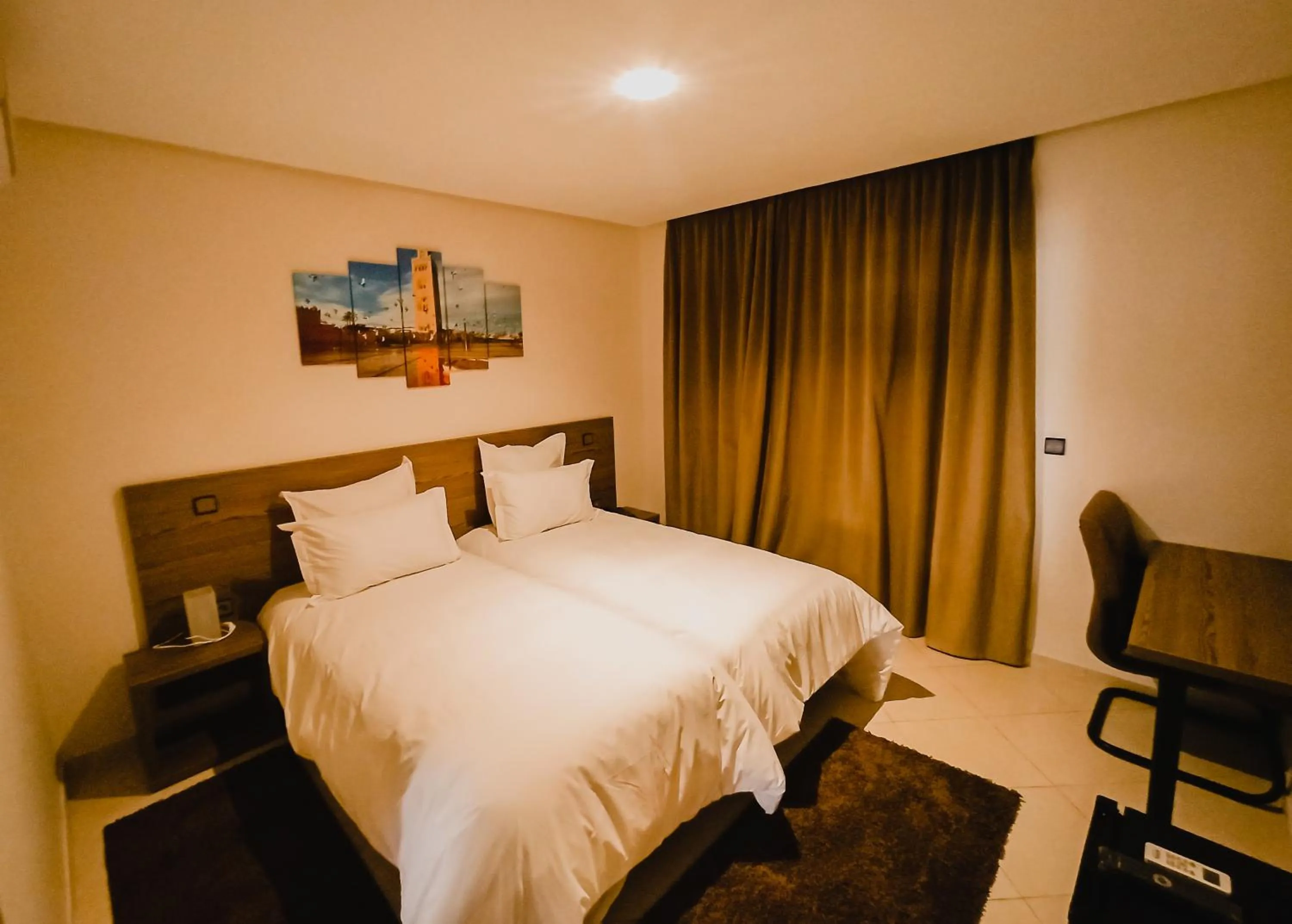 Bed in EL MOUSSAFIR HOTEL